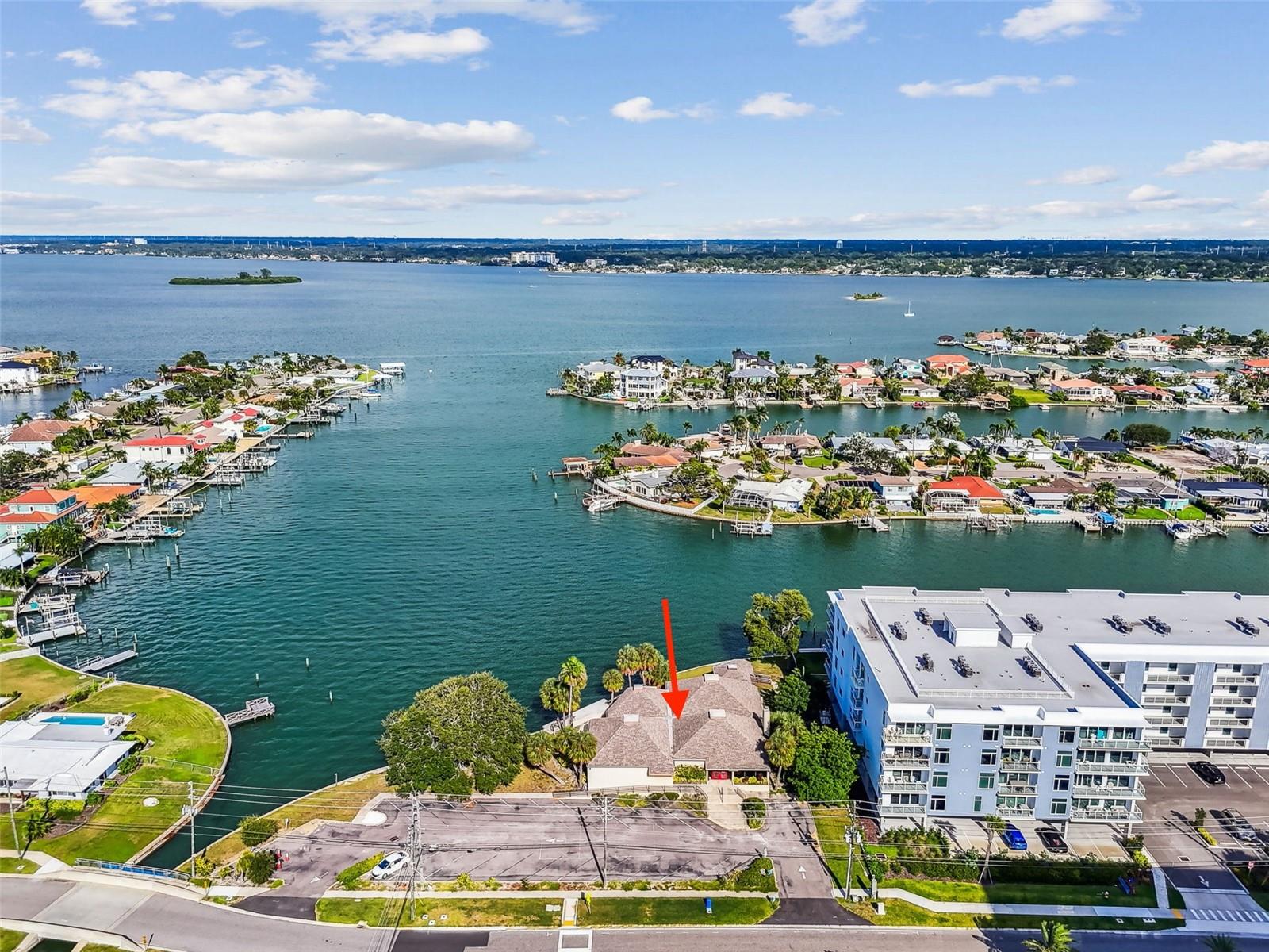 A rare waterfront land parcel situated on the shores of Clearwater Harbor within the prestigious Island Estates community, one of Clearwater's most exclusive waterfront neighborhoods. Entitled for up to 22 residential units under MHDR-NCOD zoning with a Future Land Use designation of Residential High, this 0.75-acre (32,569 SF) site features direct Clearwater Harbor frontage with potential for boat slips, and represents one of the last remaining developable parcels of meaningful scale in the submarket. Entitled for up to 22 residential units under MHDR-NCOD zoning — density secured Future Land Use: Residential High (RH) — supports condominium or townhome redevelopment .75 acres / 32,569 SF in Island Estates, one of Clearwater's most supply-constrained market. Tampa–St. Petersburg–Clearwater MSA — one of the fastest-growing metros in the U.S. Demolition-ready existing structure-economically justified under FEMA'S 50% Rule (Zoned AE) All information is deemed reliable but not guaranteed and should be independently verified by Buyer. Buyer is responsible for verifying zoning, permitted uses, development potential, dimensions, approvals, and all other matters affecting the property.