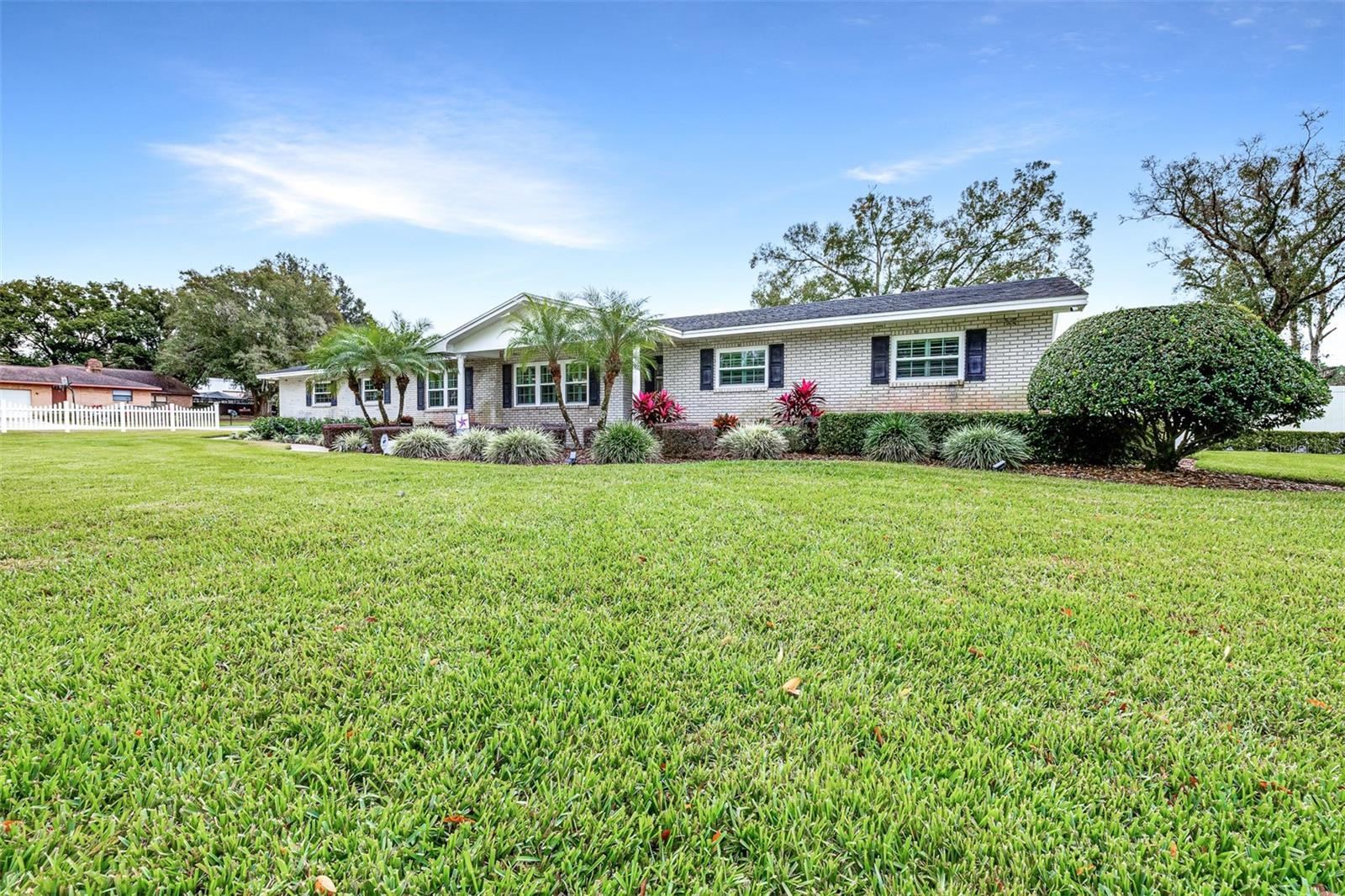 Welcome to this exceptional, move-in ready estate where quality craftsmanship, thoughtful upgrades, and resort-style living come together on an expansive 0.80-acre homesite. Impeccably maintained, this stunning 3-bedroom, 3-bathroom home with a 2-car garage offers the perfect blend of comfort, functionality, and luxury. Inside, you'll find an inviting open-concept floor plan enhanced by beautiful flooring and spacious living areas designed for both everyday living and effortless entertaining. The oversized laundry room is a standout feature, offering an abundance of cabinetry and storage to keep everything organized. Step outside to your own private oasis. The sprawling heated pool and spa, enclosed by an oversized screened lanai, create the ultimate setting for relaxing or hosting family and friends. A dedicated pool bath with a shower, plus a convenient outdoor shower, adds both comfort and convenience to your outdoor lifestyle. One of the property's most impressive features is the 30' x 30' air-conditioned workshop—ideal for hobbyists, car enthusiasts, home businesses, or additional storage. Additional highlights include a private well servicing the home, an in-floor safe, beautifully landscaped grounds, and countless upgrades reflecting true pride of ownership. Whether you're searching for room to spread out, space to pursue your passions, or a backyard designed for making memories, this one-of-a-kind property truly has it all. Opportunities like this are rare—schedule your private showing today and experience everything this remarkable home has to offer.