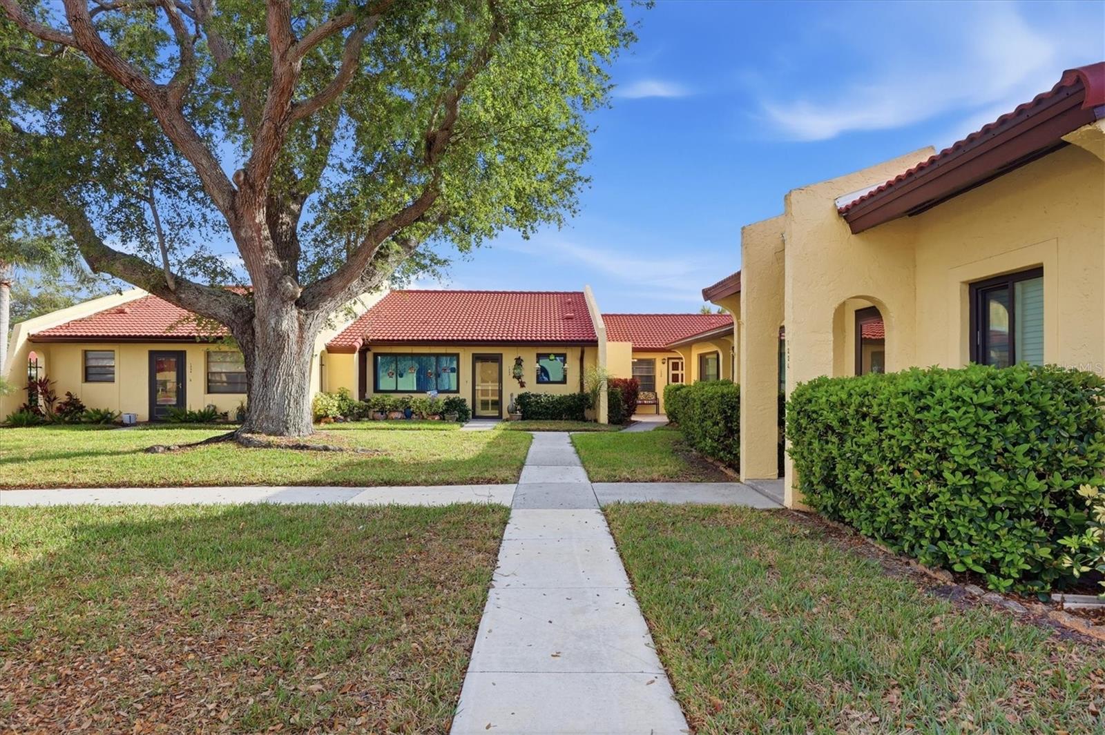 Welcome to easy Florida living in this BEAUTIFULLY RENOVATED, 1 bedroom/1 bath ground level unit that is located in a desirable, ACTIVE, 55+ community. This light and bright residence features a modern open layout, updated flooring, and a stylishly completely remodeled kitchen that includes soft-close cabinetry (to the ceiling), new stainless-steel appliances, sleek countertops, new hardware and fixtures and recessed lighting. The spacious bedroom offers ample closet space, while the updated bathroom showcases tasteful finishes and fixtures. Every detail has been thoughtfully refreshed, making this home truly move-in ready. Step out onto the private lanai, the perfect spot to enjoy your morning coffee or relax in the gentle Florida breeze while overlooking the peaceful surroundings. Enjoy the relaxed lifestyle this friendly community offers, with well-maintained grounds and opportunities to socialize with neighbors. The community heated pool, tennis courts and clubhouse are just a short stroll away. Conveniently located near shopping, dining, medical facilities and the beautiful Gulf beaches.
