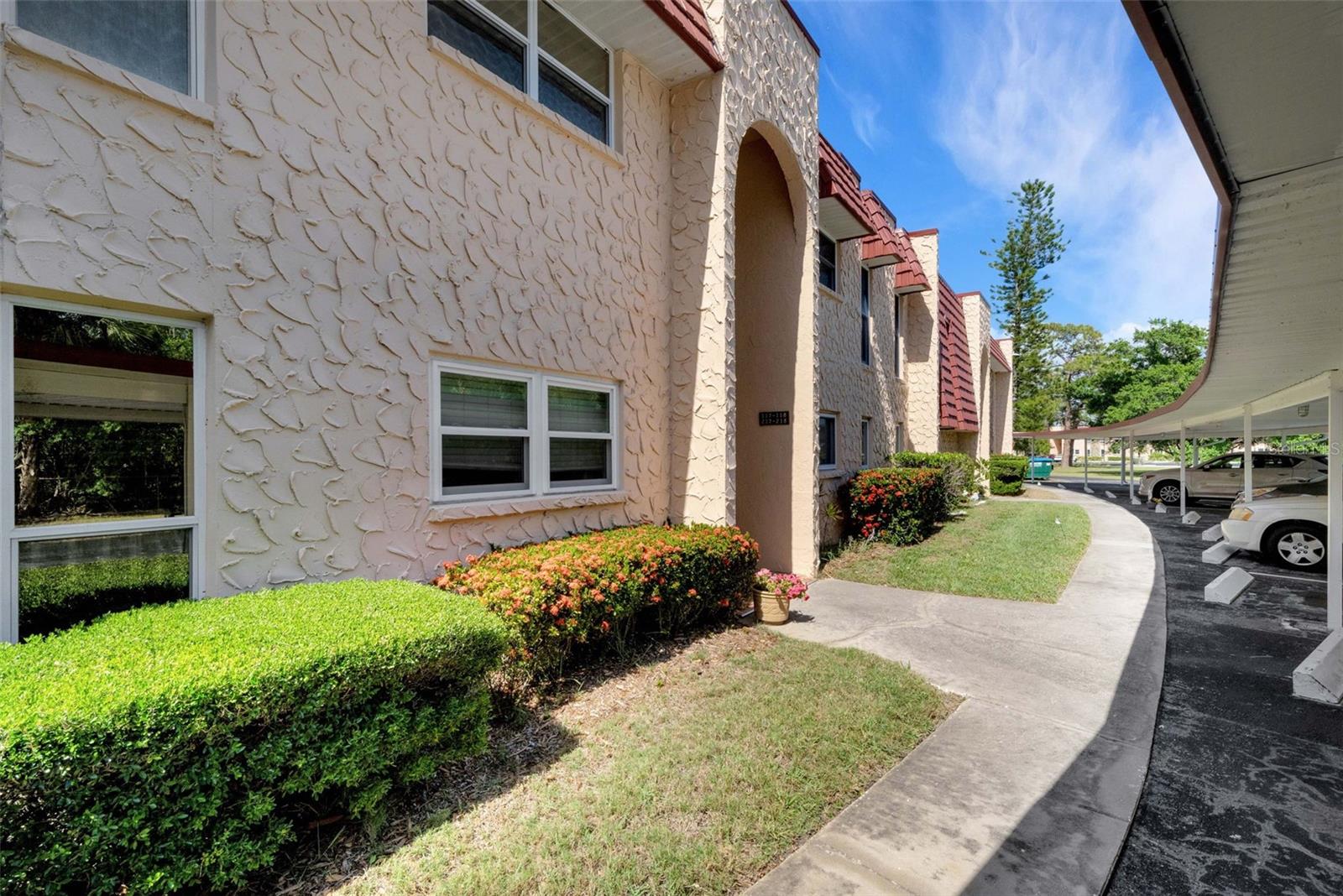 Nestled within more than 4 beautifully maintained acres in a serene park-like setting, this tastefully updated second-floor residence in The Gardens offers comfort, style, and convenience in one of Seminole’s desirable 55+ communities. Originally designed as a 2-bedroom, 1½-bath interior unit, this home has been thoughtfully transformed into a true 2-bedroom, 2-bath layout.

The remodeled kitchen is a standout feature, showcasing updated cabinetry, granite countertops, stylish backsplash, and upgraded appliances along with a breakfast bar. Additional improvements include newer windows, ceramic tile and laminate-style flooring, blinds, and beautifully remodeled bathrooms. The primary bath features a relaxing jacuzzi-style shower, creating a spa-like retreat at home.

For added convenience, the washer and dryer are located in the primary closet and vented to the outside. An additional entryway closet provides valuable extra storage space rarely found in similar units.

Whether you are searching for a full-time residence or the perfect seasonal getaway, this move-in-ready home offers an exceptional opportunity to enjoy the relaxed Florida lifestyle close to shopping, dining, parks, and Gulf beaches.