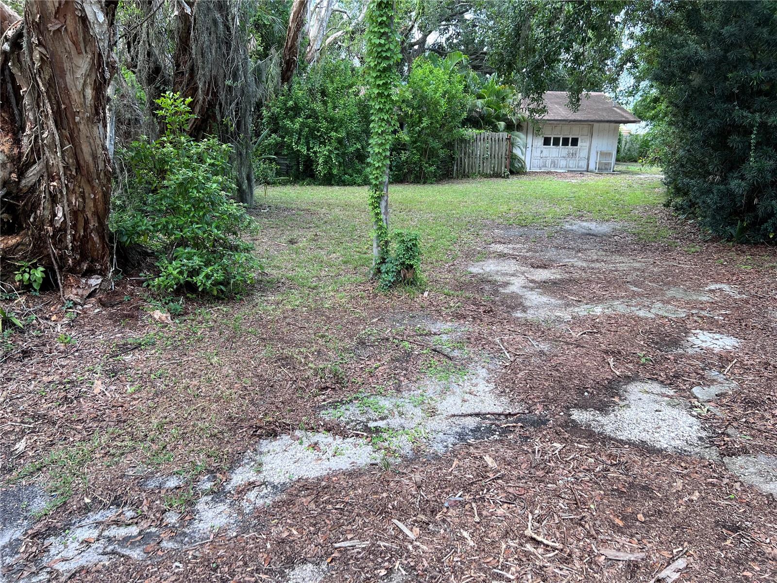 Second 10K PRICE REDUCTION!!! Charming, shaded, tranquil lot located in mature neighborhood near the center of Sarasota.  No HOA dues, CDD fees, or deed restrictions!  115' deep x 69' wide, .18 acre, 7,903 sq ft lot with detached block garage with electricity connected that was used as a workshop, being sold for land value.  5 miles to famous quartz sand Siesta Key Beach, 2 miles to Red Bug Slough Preserve with ponds, fishing pier, and nature paths, and is in highly-rated Riverview High School District.  Under current zoning, lot is nonconforming and is thus an unbuildable lot and the detached block garage can not be rehabilitated or used for anything but contact Sarasota County Zoning Department to inquire about how to apply to request rezoning of the property to become buildable.  Ask about the process required to change this lot's current status to make it a buildable lot.