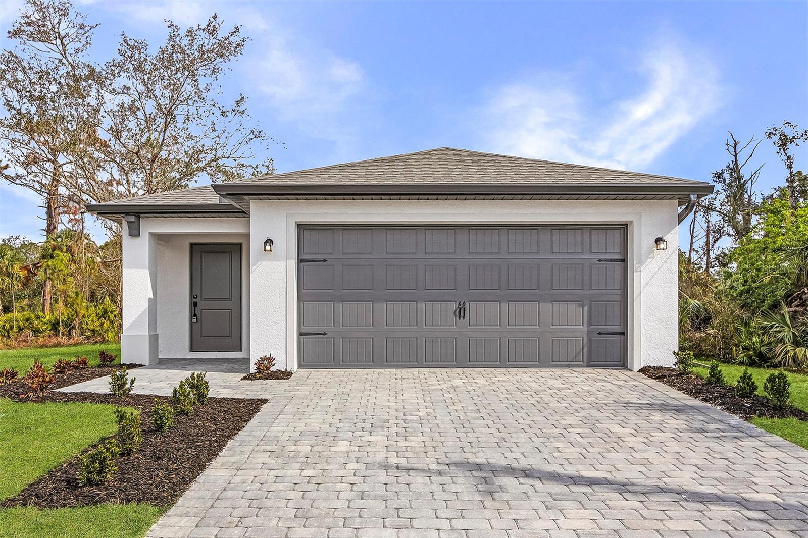 Under Construction. PRICE REDUCED! MOVE IN READY! The Captiva by LGI Homes is a beautifully designed 3-bedroom, 2-bathroom home in North Port, offering the perfect balance of style and functionality. The open concept living area is ideal for entertaining, while the spacious master suite with a walk-in closet provides a peaceful retreat. Two additional bedrooms present plenty of space for family or guests. Enjoy the Florida sunshine on the inviting back patio, perfect for relaxation and gatherings. This home is an exceptional choice for creating lasting memories with your loved ones. City Water. Underground Powerlines.