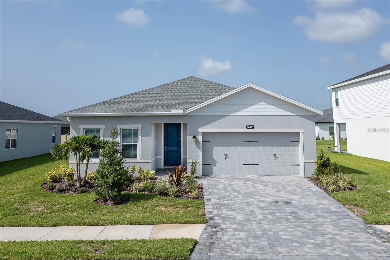 Experience the comfort of modern living in this beautiful 3-bedroom, 2-bath home with a spacious office, located in the growing West Port community. Built in 2024, this 2,017-square-foot home offers an open floor plan with ceramic tile throughout the main living areas and soft carpet in the bedrooms. The well-appointed kitchen features stainless steel appliances, including a refrigerator, range, microwave, dishwasher, washer, and dryer. The spacious primary suite offers a relaxing retreat, while the dedicated office provides the perfect space for working from home or a hobby room. Outside, enjoy a private brick patio and a 2-car garage with a brick paver driveway. Conveniently located near Centennial Park and the Centennial Recreation & Aquatic Center, you'll have easy access to fitness facilities, swimming, sports courts, walking trails, playgrounds, and year-round recreational activities. West Port also offers sidewalks, green spaces, and is just minutes from shopping, restaurants, Charlotte Sports Park, and Gulf Coast beaches. If you're looking for a newer home in a convenient location with plenty of room to live, work, and relax, this is one you won't want to miss. Schedule your showing today!