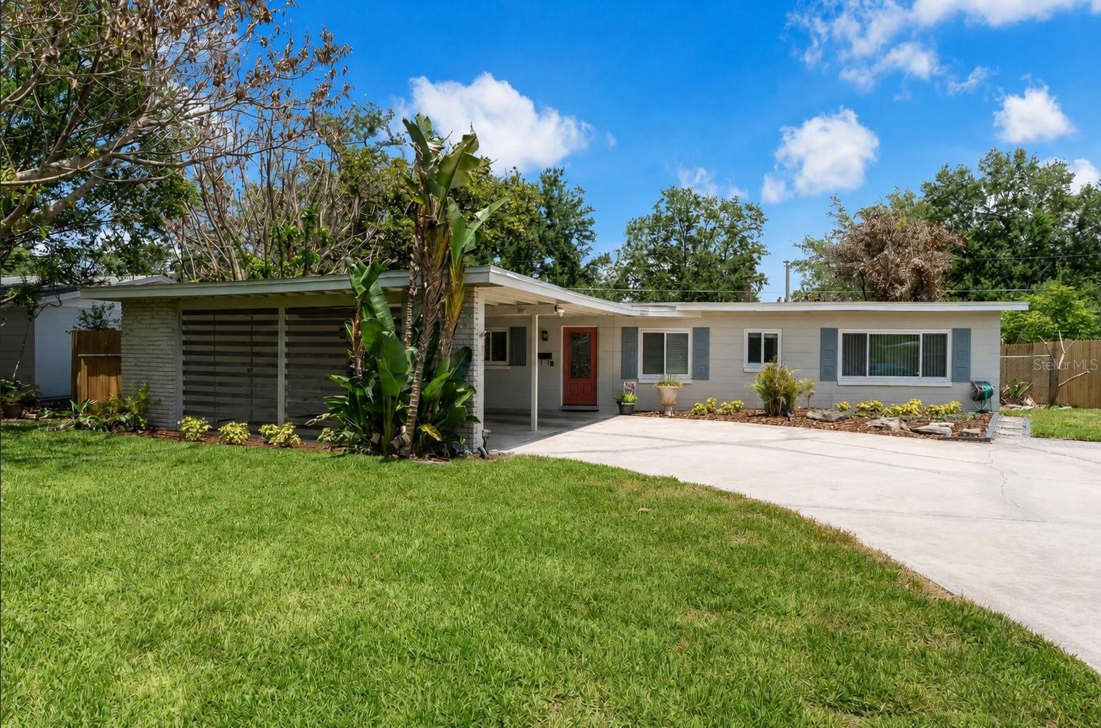 One or more photo(s) has been virtually staged. This move-in-ready classic ranch-style pool home offers a relaxed 60’s retro vibe with vaulted ceilings, 4 bedrooms, 2 full bathrooms, and light-filled living spaces. Newer manufactured wood flooring flows throughout the main living spaces, complementing the spacious layout that includes a formal living room, dining area, breakfast nook, and a large free-flowing kitchen designed for both everyday living and entertaining. The kitchen features an open space concept, island, solid wood cabinets, granite countertops, over-range hood, and stainless-steel appliances.

All four bedrooms are positioned just off the main hallway, creating a practical and functional layout. The 4th bedroom features French doors and offers exceptional flexibility for use as a home office, creative studio, workout space, or playroom, with a view of the pool and backyard. The primary bedroom includes an ensuite with a tiled shower. Additional features include an indoor laundry area, two-car carport with 2 storage rooms, and a large lot that adds to the home’s overall sense of space and privacy. Situated on a quiet street with limited through traffic, this home offers a peaceful setting while remaining close to everything Winter Park has to offer.

The private, fully fenced backyard is a standout feature, offering a beautifully landscaped setting with a sparkling pool, Tiki Bar and plenty of space for outdoor entertaining or relaxing. Whether enjoying a quiet morning coffee, relaxing with a good book, or unwinding with a glass of wine in the gazebo, this outdoor space is designed to embrace the Florida lifestyle. Bonus features include a well-water irrigation system and newly sodded yard.

Recent updates provide added peace of mind, including a roof installed in 2015, along with a new HVAC heat pump system installed 2026 with (10-year Warranty) and water heater installed in 2026. The home has been well maintained both inside and out, offering true move-in-ready convenience.

Located in the sought-after Brookshire Elementary, Glenridge Middle, and Winter Park High School zones, the home is also close to Rollins College, Full Sail University, AdventHealth Winter Park, and the Orlando VA Medical Center. Outdoor enthusiasts will appreciate nearby Cady Way Trail, Blue Jacket Park, and Lake Baldwin, along with close proximity to Lake Berry and the neighborhood boat ramp and fishing dock. Buyer should verify any access rights or neighborhood use details.