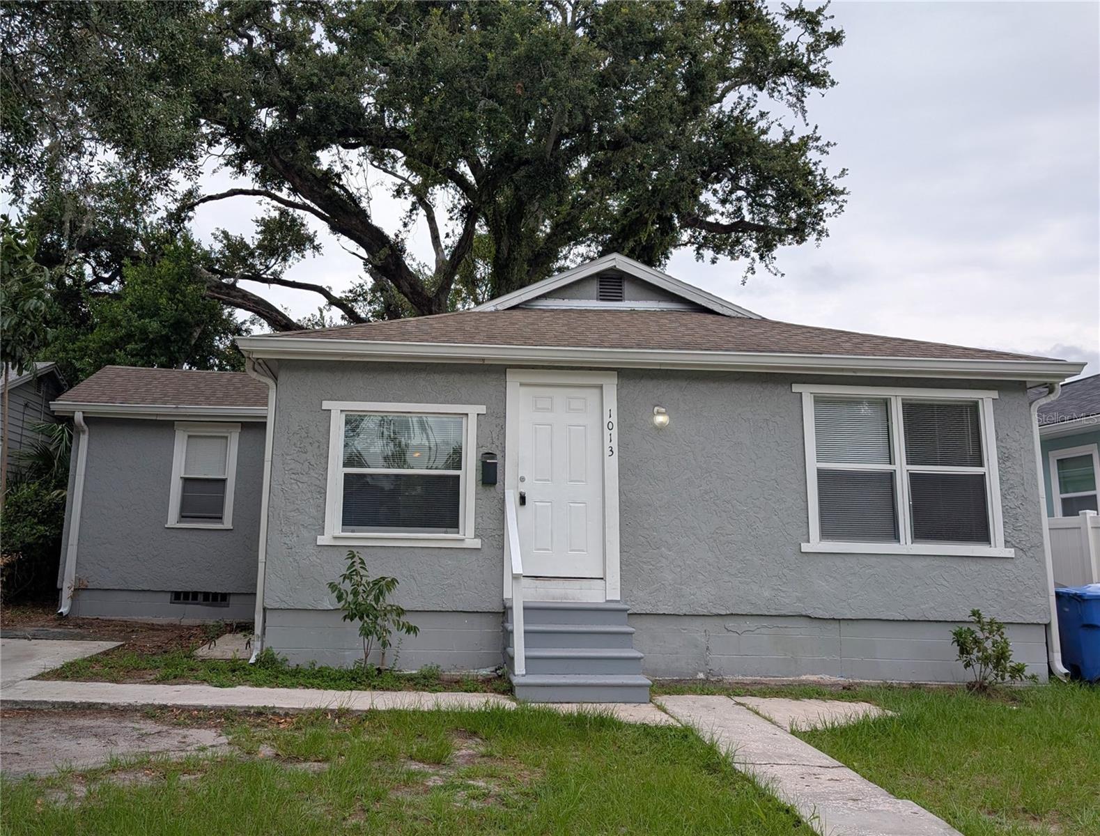 Charming 4-bedroom, 2-bathroom single-family home that is pet-friendly, move-in ready, and has no HOA fees. As you arrive at this beautiful home, you'll appreciate the natural surroundings, peaceful shaded areas, and all the charm that the City of St. Petersburg has to provide. Step inside to find neutral colors, abundant natural light, and attractive flooring throughout. The kitchen features spacious countertops, ample cabinetry, and plenty of storage. With four bedrooms, this home offers flexibility to accommodate your needs, whether you need a home office, a study, a guest room, or an entertainment space. The home includes washer and dryer hookups only; tenants must provide their own appliances. Enjoy the spacious backyard, perfect for weekend gatherings, outdoor entertaining, or simply relaxing with a good book. This pet-friendly property is conveniently located in the heart of St. Petersburg, with easy access to restaurants, shopping, and major routes to Tampa and Clearwater. Contact us today to schedule a showing. We show properties seven days a week.