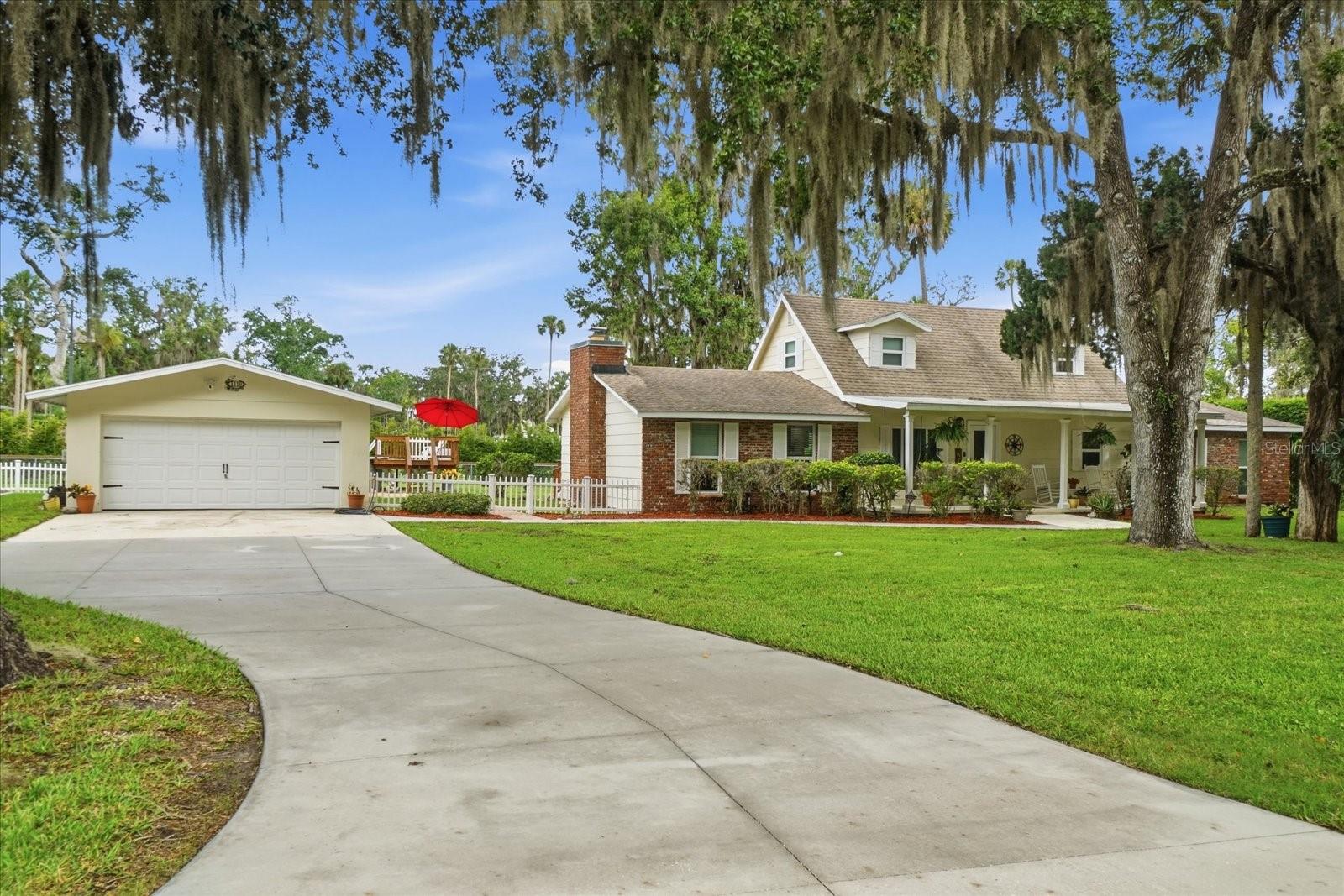 Enjoy the Crystal River lifestyle in this spacious 4-bedroom home featuring deeded water access to Crystal River. The interior offers an updated kitchen with custom soft close cabinetry, solid-surface countertops, stainless steel appliances, a breakfast bar, and an inviting living area highlighted by a dramatic stone fireplace and wood-plank ceiling. The oversized primary bedroom provides flexible space for a sitting area, office, or exercise equipment. Outdoor features include a detached garage, expansive driveway, RV hookup or boat parking, a paver patio, and an above-ground pool with deck. Situated on a large, attractive lot near boating, fishing, springs, dining, and other Nature Coast amenities.This home is just over city limits and sits in the county so you can VRBO this home.It has great income potential !