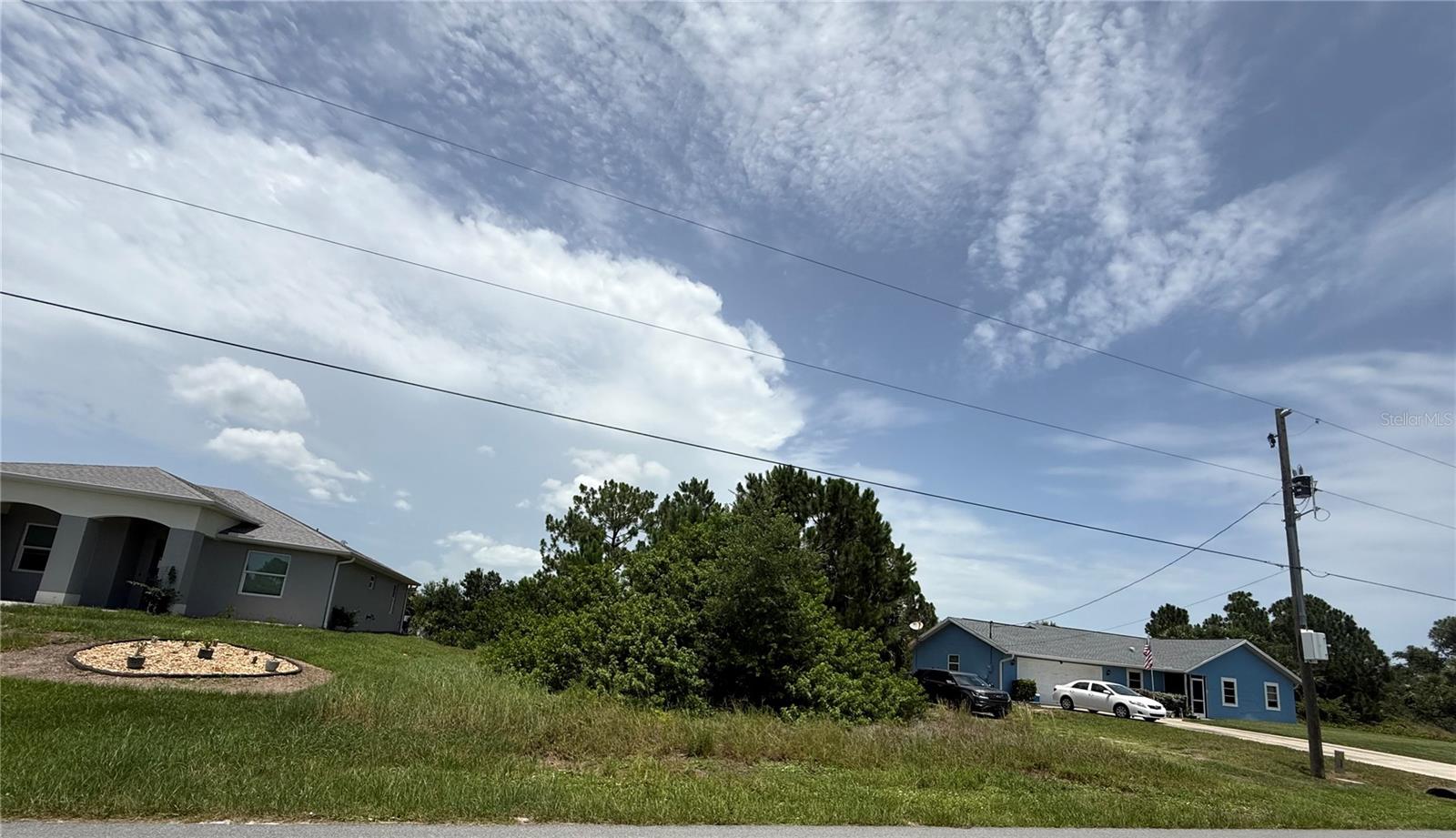 Build your new home on this waterfront lot in one of Port Charlotte's fast-growing neighborhoods, where many new homes are being built. City water is available, and the property is situated on a freshwater canal, perfect for kayaking, fishing, and other small watercraft. The lot is not located in a flood zone. Conveniently located just minutes from shopping, dining, parks, golf courses, Port Charlotte Town Center, the Atlanta Braves and Tampa Bay Rays spring training facilities, and the Gulf beaches of Englewood, Boca Grande, and Sarasota, this property offers an excellent opportunity to build your Florida dream home or invest in an area experiencing continued growth.