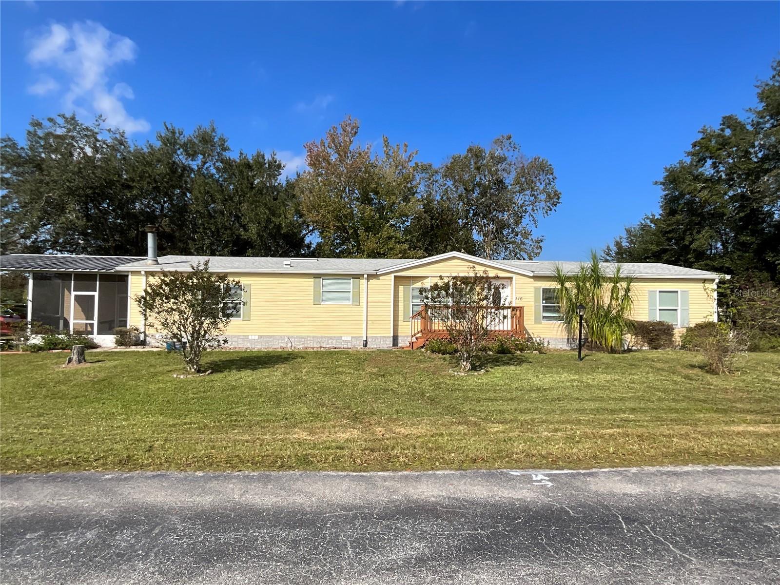 This beautiful 55+ community is located near the Saint Johns River. What a better way to retire and go fishing and relaxing by the river. Bring your boat and park it at your own boat slip. YESSSSS..... Boat slip is included with this home. Get together with your new friends and enjoy the activities they prepare for the communities. 
This comfortable home is located in a corner lot. ROOF WASREPLACED in 2024, Side ENCLOSED PORCH was done in 2021. AC duct were replaced in November. Master Bathroom has a garden tub, walk in closet, double sink. Has a one car garage at the back that can fit a car or you can use it as a workshop. The carport on the side also fits a golf cart or a regular sized car. The carport in the front fits a car as well! The storage closet in the carport is comfortable not only for storage but it can be a workshop. The Home has a formal Dining room and Living room with glass sliding doors that lead to the back porch. The Family room has a fireplace that lead to the Laundry room.