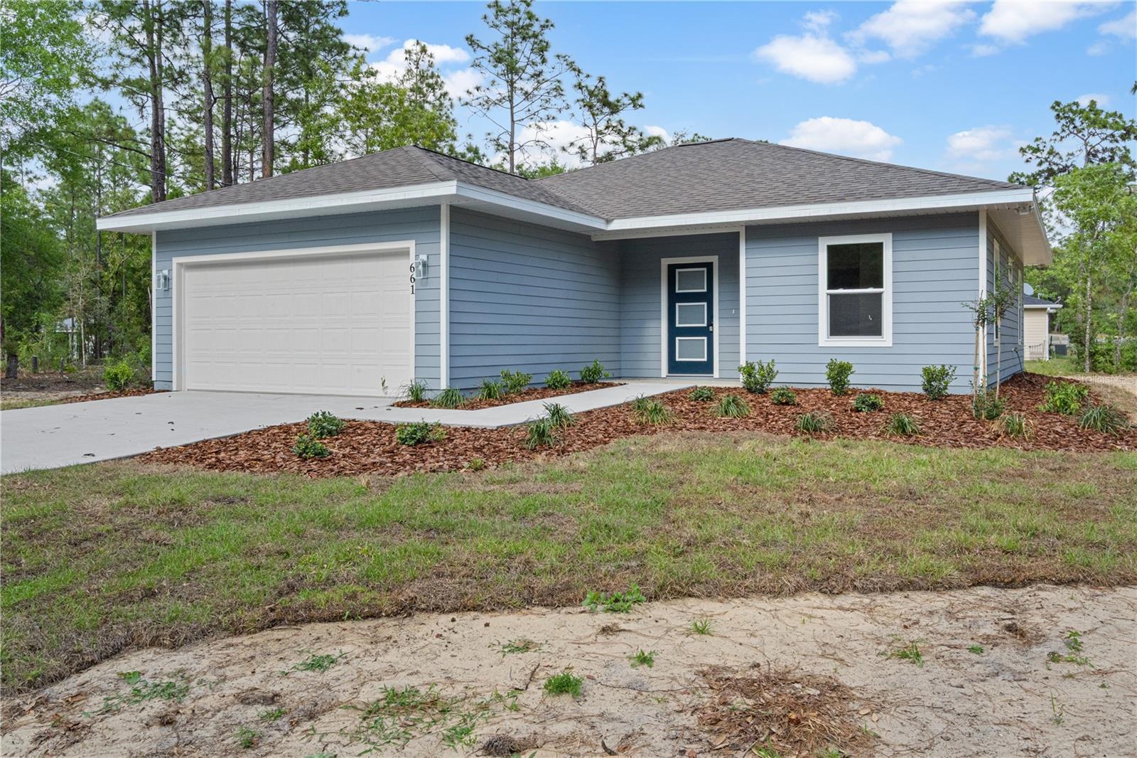 BRAND NEW CONSTRUCTION ON A QUIET COUNTRY STREET! This beautifully finished 3 bedroom, 2 bath home with a 2-car garage offers the perfect blend of modern comfort and peaceful country living. Step inside to an open floor plan featuring a spacious eat-in kitchen with gorgeous wood cabinetry, granite countertops, and a convenient breakfast bar perfect for casual dining or entertaining. The primary suite is thoughtfully designed with dual vanities, dual closets, and a walk-in shower for added comfort and functionality. Situated nicely on a 1/4 acre lot on a quiet street behind the old Williston golf course just a short distance from a paved road, this property offers the relaxed lifestyle buyers are searching for while still being convenient to nearby amenities. If you’ve been looking for a brand-new home with quality finishes and a peaceful setting, this one is ready for you!