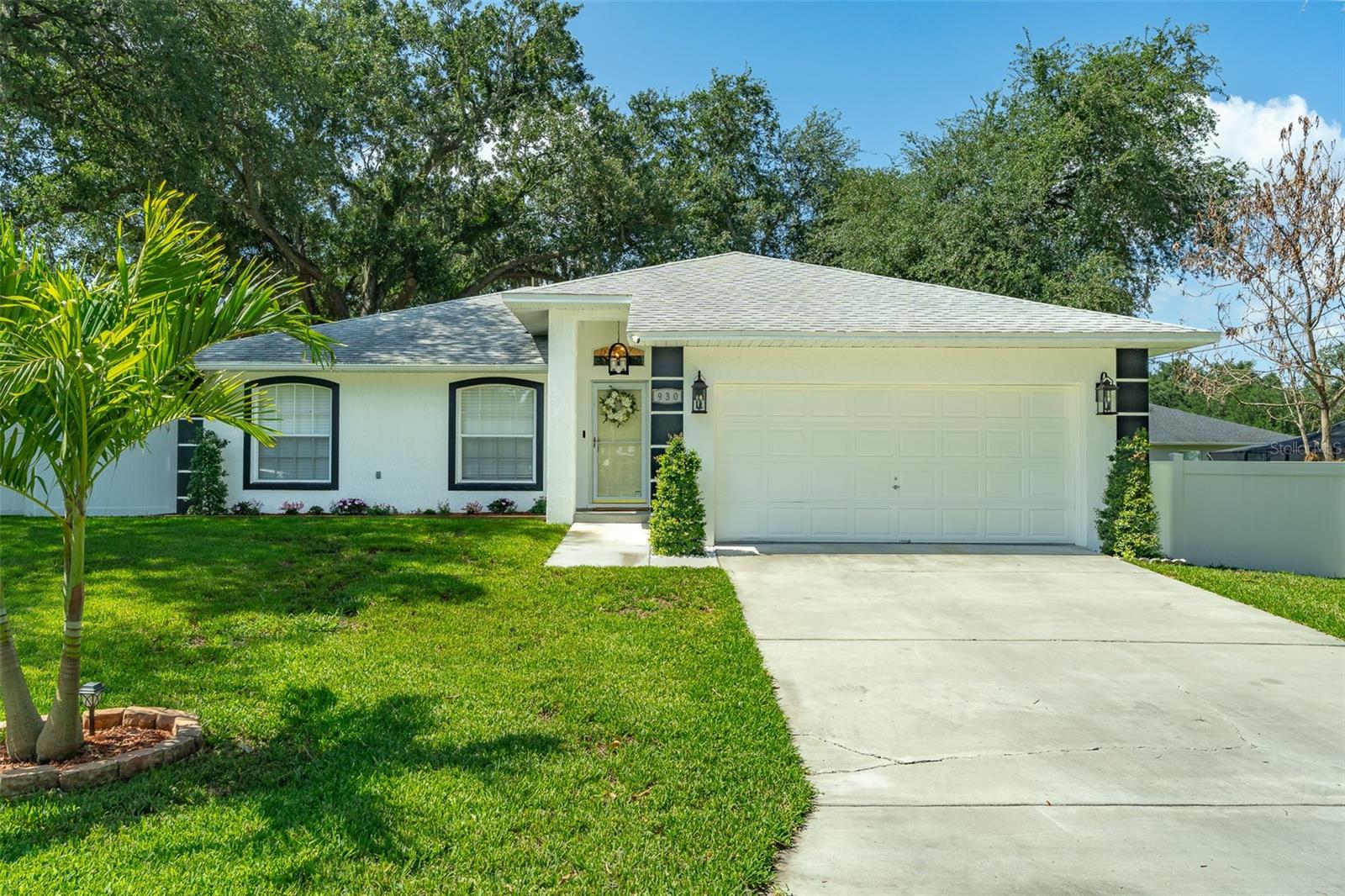 Check out this beautifully remodeled block home featuring quality finishes and exceptional craftsmanship throughout. This 3-bedroom, 2-bath home offers the perfect blend of comfort, style, and convenience. The stunning kitchen showcases Shaker-style cabinets, quartz countertops, and a beautiful center island, and modern stainless steel appliances. The bathrooms have also been updated with quartz countertops and contemporary plumbing and electrical fixtures. Elegant title flooring runs throughout the entire home. Additional upgrades include new cabinetry, countertops, flooring, fixtures, fresh interior and exterior paint, and new landscaping with an irrigation system. The home also features a large wood deck, a shed, a white vinyl fence, and a spacious patio area perfect for entertaining. Built for convenience, this home is ideally located between Tampa and Orlando with easy access to the Polk Parkway and I-4, making commuting a breeze. The split floor plan provides privacy, while the spacious primary suite includes a large walk-in closet. The stove can easily be converted back to propane if desired. Enjoy relaxing on the screened back porch and take advantage of the home's close proximity to shopping, restaurants, and medical offices. Roof-2018. This move-in-ready home has everything you need. NO HOA OR CDD. Welcome home!