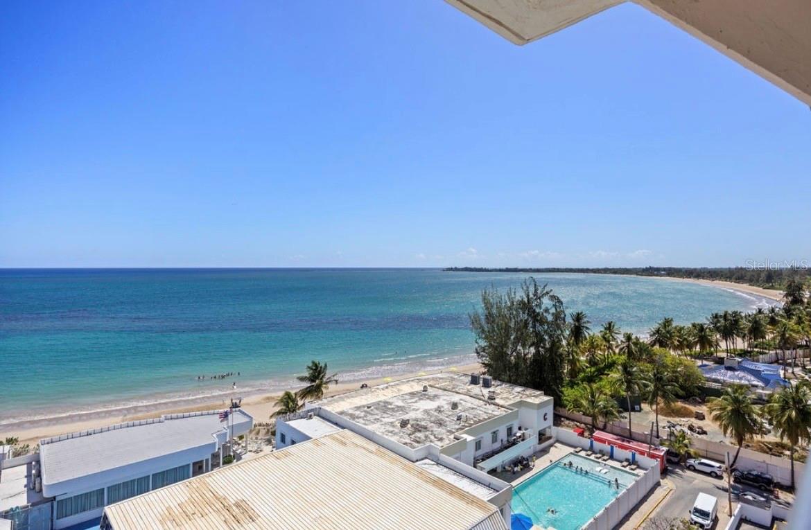 Comodoro Condominium #1003 | Isla Verde, Puerto Rico
Exceptional views, extensive renovations, and a prime beachfront location come together in this beautifully updated residence in the heart of Isla Verde.
Located on the 10th floor, this stunning apartment offers breathtaking panoramic ocean views from virtually every room. Whether enjoying your morning coffee, entertaining guests, or simply relaxing at home, the Caribbean Sea becomes part of your everyday lifestyle.
The apartment underwent a complete renovation in 2014–2015, including significant upgrades to plumbing, electrical systems, kitchen, bathrooms, windows, and interior finishes. A second bathroom was added, all plumbing was reinstalled, the electrical system was completely upgraded throughout the apartment, and new state-of-the-art storm-resistant windows and shutters were installed for enhanced comfort and peace of mind.
The thoughtfully designed kitchen features premium GE Monogram appliances, including double ovens, microwave, and under-counter dishwasher. Beautiful Blue Bahia marble countertops, island, and backsplash create an elegant focal point, complemented by designer Luminati pendant lighting.
Both bathrooms feature high-quality finishes, including limestone flooring and walls, glass tile accents, and contemporary details that blend style and functionality.
The residence is being sold fully furnished, with select furnishings and accessories from renowned brands such as Mitchell Gold, Arkitektura, Palacio, and Ralph Lauren, offering a truly move-in-ready opportunity.
One of the property’s most attractive features is that short-term rentals (Airbnb) are permitted, providing exceptional flexibility for personal use, vacation enjoyment, or income-producing investment potential.
Ideally located in Isla Verde, just steps from the beach, hotels, restaurants, entertainment, beach clubs, and only minutes from Luis Muñoz Marín International Airport, this property offers the perfect combination of convenience, lifestyle, and investment appeal.
Sold Fully Furnished
HOA: $331.01/month?Insurance: Approximately $1,600/year