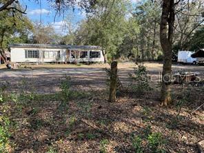 Nestled in the quiet town of Floral City, this large Property offers both convenient commute to larger cities yet the home in the country feel.
Three/Two and two outbuildings.