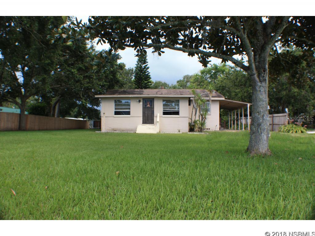 Location! This fixer upper is in a fantastic location only steps to the river and the new proposed marina / restaurant. Solid concrete block home and detached garage with lots of potential located between US 1 and River. Oversized lot with plenty of room to add more house, garage, pool, or RV/Boat parking. Quiet dead end road. No HOA. Close to shopping, minutes to the beach and boat ramps. Repairs and updates needed, cash offers only. ;Water: City