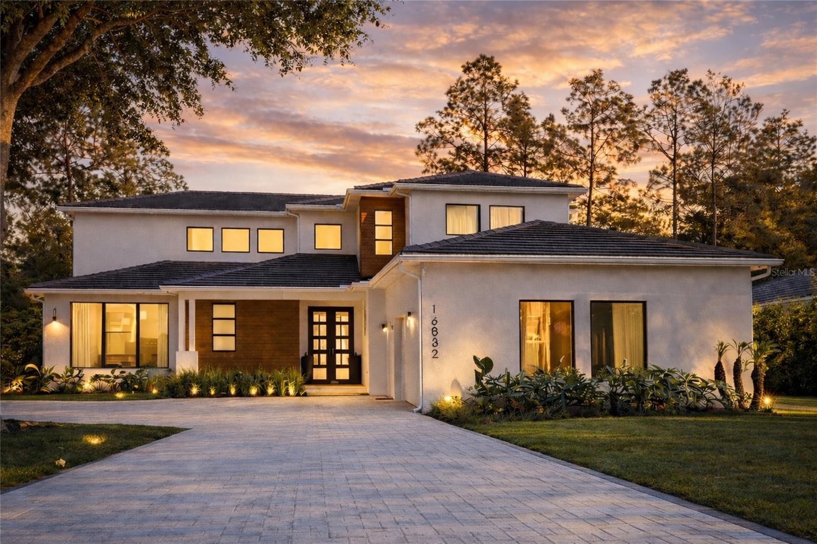 Under contract-accepting backup offers. BETTER THAN A NEW CONSTRUCTION. A rare opportunity to own one of Bella Collina’s most distinctive luxury homes — fully upgraded, move-in ready.

Designed for elevated living, this one-of-a-kind residence blends modern sophistication, warmth, and a wellness-focused lifestyle in one of Florida’s most exclusive communities.

From the moment you enter, you’re welcomed by abundant natural light flowing through expansive windows, highlighting the home’s custom oak wood paneling and refined finishes throughout. Thoughtfully integrated indirect LED lighting enhances the ambiance, creating a warm and elegant atmosphere that transitions beautifully from day to night.

The main living area is anchored by an elegant fireplace, offering the perfect setting for both intimate evenings and relaxed gatherings.

Designed for both everyday living and entertaining, the gourmet kitchen is complemented by two spacious pantries—one dedicated to food storage and another designed for organization, dishes, and essentials—delivering both beauty and exceptional functionality.

A true standout feature of this home is its private wellness retreat, featuring a fully equipped gym, infrared sauna, and cold plunge—allowing you to prioritize health, recovery, and performance without ever leaving your home.

The primary suite is designed as a peaceful sanctuary, with a spacious layout and a custom walk-in closet built for optimal organization. The bedroom is enhanced with red ambient lighting designed to support natural melatonin production, creating a calming and restorative sleep environment.

Step outside and experience your own private resort-style backyard. A heated pool and spa are surrounded by expansive green space, perfect for relaxation and entertaining. The outdoor BBQ area is beautifully designed and well-ventilated for year-round use. The property also features a rare and impressive private soccer field, offering a unique space for recreation, family time, and outdoor living.

The home offers five bedrooms, each with its own en-suite bathroom and custom walk-in closet, ensuring comfort, privacy, and convenience for all. One bedroom is currently configured as a home office and can easily be converted back if desired.

Additional highlights include:

• Over $300,000 in custom upgrades and finishes
• Custom-designed wine cellar with ambient lighting
• Dedicated supplement/shake station with built-in outlets
• Oak wood detailing throughout the home
• Integrated indirect lighting for a warm, elegant ambiance
• Guest suite conveniently located on the first floor
• Custom closets in every bedroom
• Expansive outdoor green areas
• Heated pool and spa
• Private soccer field
• Impeccably maintained, like-new condition

This is more than a home — it’s a rare opportunity to step into a fully finished, move-in-ready luxury lifestyle in Bella Collina.