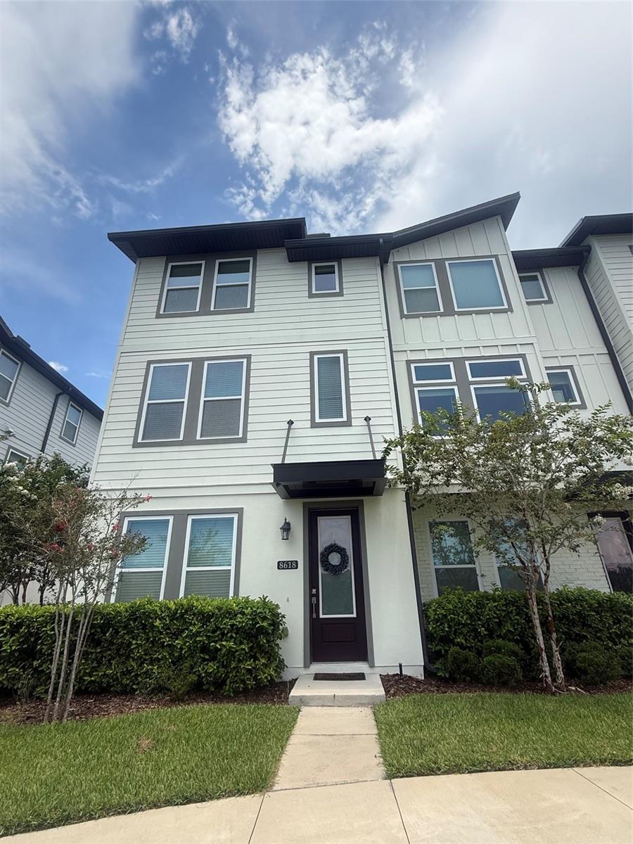 Welcome home to this beautiful and modern townhome located in the highly desirable, resort-style community of Laureate Park in Lake Nona! Featuring an open and bright floor plan, this property offers the perfect blend of style, comfort, and convenience. The heart of the home boasts a sleek, contemporary kitchen complete with upgraded cabinetry, stainless steel appliances, and a spacious island that overlooks the main living and dining areas—ideal for both everyday living and entertaining. Upstairs, you will find well-appointed bedrooms, including a spacious primary suite featuring a walk-in closet and an en-suite bathroom with dual vanities and a modern shower. Step outside to your private courtyard oasis, perfect for enjoying your morning coffee or evening relaxation, which seamlessly connects the home to a rear-facing 2-car garage. As a resident of Laureate Park, you will enjoy access to unparalleled community amenities, including the resort-style LP Fitness Center, the Aquatic Center (featuring a lap pool, zero-entry family pool, and splash pad), beautiful community parks, playgrounds, dog parks, and miles of scenic walking, running, and biking trails. Perfectly situated just minutes from Lake Nona Medical City, highly-rated schools, the Lake Nona Town Center, Boxi Park, Orlando International Airport (MCO), and major highways like SR-417 and SR-528. Rent includes high-speed fiber internet.