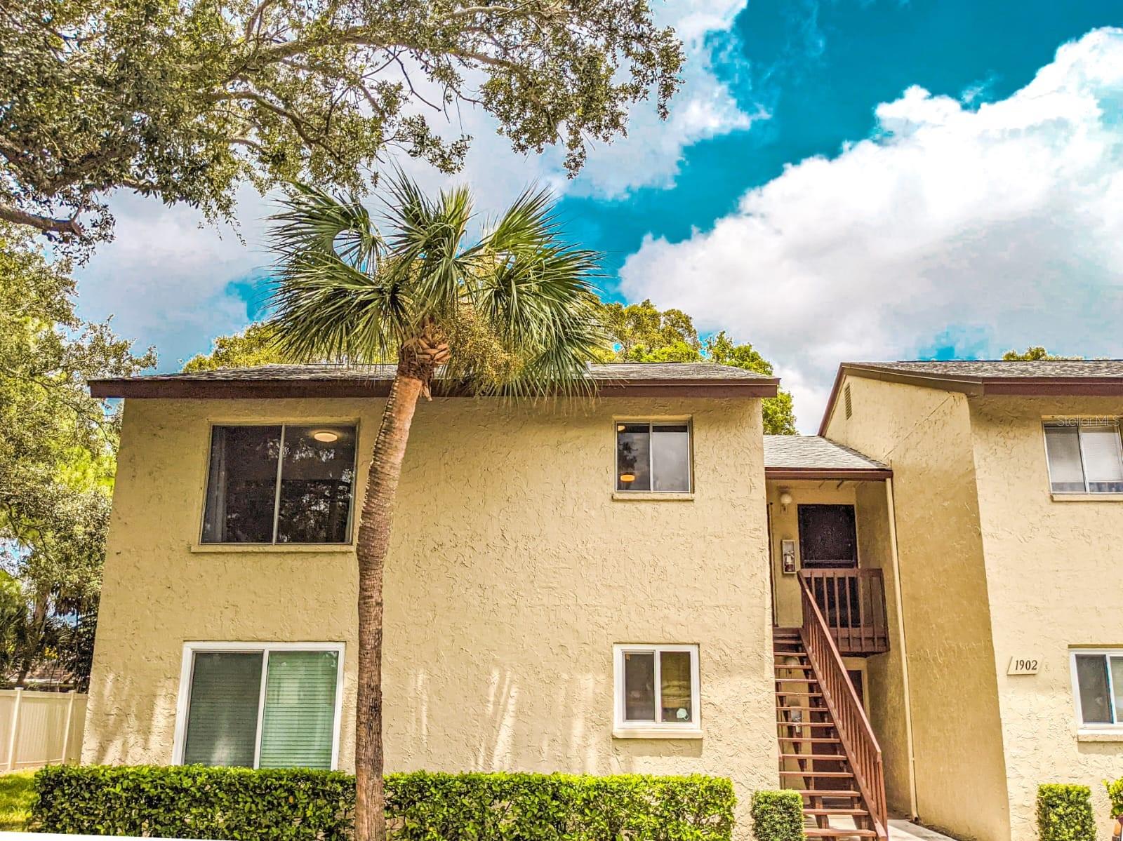 Welcome to Woodside Village Condominiums, situated in the Largo/Clearwater area of Pinellas County, this one bedroom/one bath Villa is only about a 15-minute drive to local premiere beaches. This community welcomes you home with attractive pool, club house, entertainment and landscaping, including tropical flowers, mature Oak and Palm trees. When you arrive at Unit 1902, convenient parking is right at your front door. Lots of guest parking provides a welcoming venue for all who visit you. As you enter the Villa, the beautiful open combo view of the unit greets you from this open concept. Three community pools, a Clubhouse, shuffleboard, an onsite laundry facility, convenient shopping, and restaurants, all reflect Florida living at its best! This Villa is a special must see now!