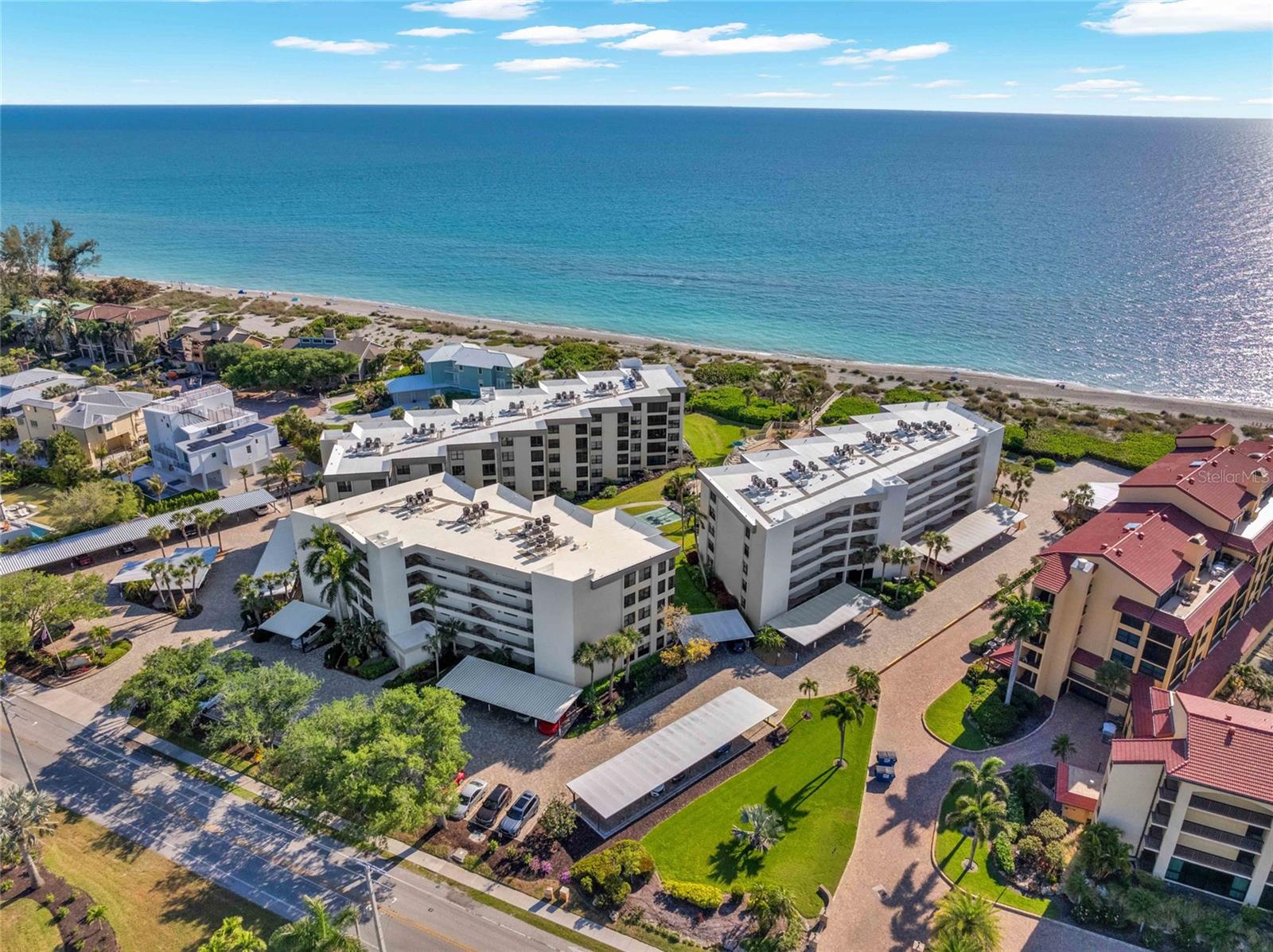 Ready to Enjoy the Great Life? Welcome to your own piece of paradise at Island Reef, one of Siesta Key's most sought-after Gulf-to-Bay Communities. Perfectly positioned in the desirable "A" Building, this beautifully maintained and furnished second-floor end unit offers breathtaking panoramic views of the Gulf of Mexico from the moment you walk through the door. Natural light pours into the residence, while expansive water views create a peaceful backdrop that defines true coastal living. Offering over 1,200 square feet, this two-bedroom, two-bath residence features a desirable split-bedroom floor plan that provides comfort and privacy for both owners and guests. Thoughtfully updated over the years and offered turnkey furnished, the condo is ready to enjoy immediately while still providing the opportunity to personalize over time. Whether you're preparing dinner with the Gulf as your backdrop, enjoying your morning coffee on the lanai, or ending the day with one of Siesta Key's unforgettable sunsets, every space is designed to embrace the waterfront lifestyle. Life at Island Reef extends well beyond your front door. Begin your mornings with a walk along the private beach at Turtle Beach, spend afternoons kayaking or paddleboarding through Little Sarasota Bay, or watch dolphins play in the Gulf from the community's beachfront pool. Boating enthusiasts will appreciate the community's bayside docks with lift capability and direct access to Sarasota Bay and the Intracoastal Waterway.
Residents enjoy an impressive collection of resort-style amenities, including two heated pools, private beach access, tennis and pickleball courts, shuffleboard, a fitness center, clubhouse, library, fishing pier, kayak and bike storage, beautifully landscaped walking paths, on-site management, and covered parking. Ideally located on the quieter southern end of Siesta Key, Island Reef offers a relaxed coastal atmosphere while remaining just minutes from Siesta Key Village's dining, shopping, and entertainment. Don't forget to check out the complimentary trolley that goes directly to the village!! Whether you're searching for a full-time residence, seasonal retreat, or investment opportunity, this is a Rare Opportunity to own a beautifully furnished & spacious Gulf-front Condominium in Island Reef one of Siesta Key's premier Gulf-to-Bay communities, where lush tropical landscaping, resort-style amenities, private beach access and unmatched Coastal lifestyle come together harmoniously to create the perfect place to feel at Home. Call today to Book a Private Showing - these opportunities don't last long!