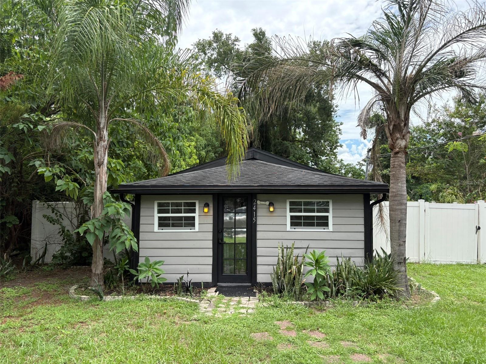 Welcome home to this adorable, move-in-ready residence offering just under 1,000 square feet of thoughtfully designed living space in the heart of Downtown Orlando.  Perfectly situated with easy access to dining, shopping, entertainment, major highways and zoned for the very highly sought after school district (Blanker k-8 and Boone high school.)  Inside, you'll find an inviting layout featuring an updated kitchen with granite countertops, stainless steel appliances and a private laundry room.  In addition to the primary bedroom, a separate flex room provides endless possibilities which can serve as a home office, nursery, workout room, creative space to fit your lifestyle or second bedroom with it's own rear exit and closet.  Step outside to enjoy the expansive, fully fenced backyard, offering exceptional privacy and plenty of room for pets, gardening, entertaining, or even future expansion. The oversized lot is a rare find in this desirable location.  Whether you're a first-time homebuyer, downsizing, or looking for an investment opportunity, this charming home combines character, convenience, and versatility in one of Orlando's most desirable locations.