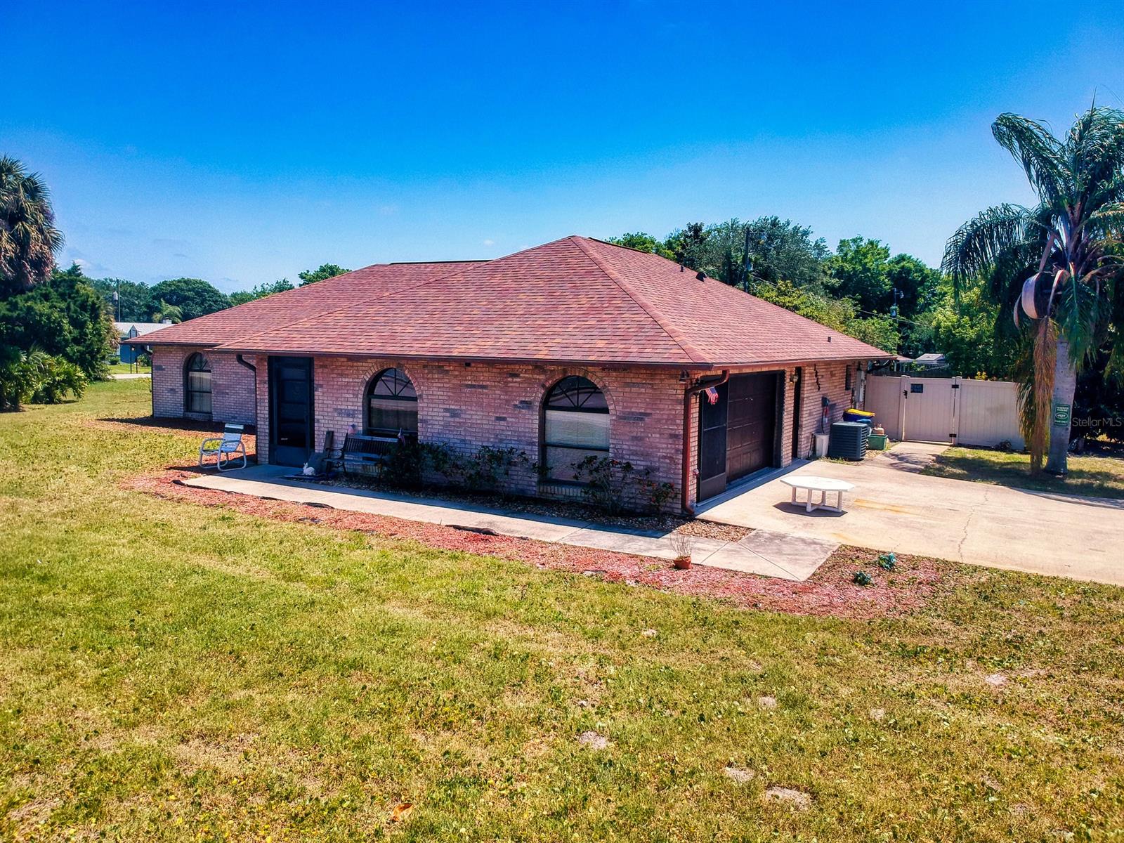 IF YOU ARE LOOKING FOR SPACE YOU HAVE FOUND IT. LOTS OF LAND, AND LOTS OF HOUSE PLUS AN INGROUND SWIMMING POOL. THE SWIMMING POOL WAS RECENTLY EMPTIED, CLEANED AND ALL NEW EQUIPMENT INSTALLED. MOST OF THE YARD IS FENCED. THIS PROPERTY IS 260 X 125 YES 3/4 OF AN ACRE ON INDIAN RIVER BLVD. THIS PROPERTY RUNS FROM VICTORY PALM DRIVE TO WILLOW OAK. THE HOME IS LARGE, WITH INSIDE LAUNDRY, OPEN FLOOR PLAN AN OVERSIZED FLORIDA ROOM OVERLOOKING THE LARGE INGROUND POOL. ALL BEDROOMS ARE LARGE AND THE MASTER BEDROOM HAS FRENCH DOORS THAT LEAD TO THE FLORIDA ROOM. THE ROOF IS LESS THAN 7 YEARS OLD. ;Water: City