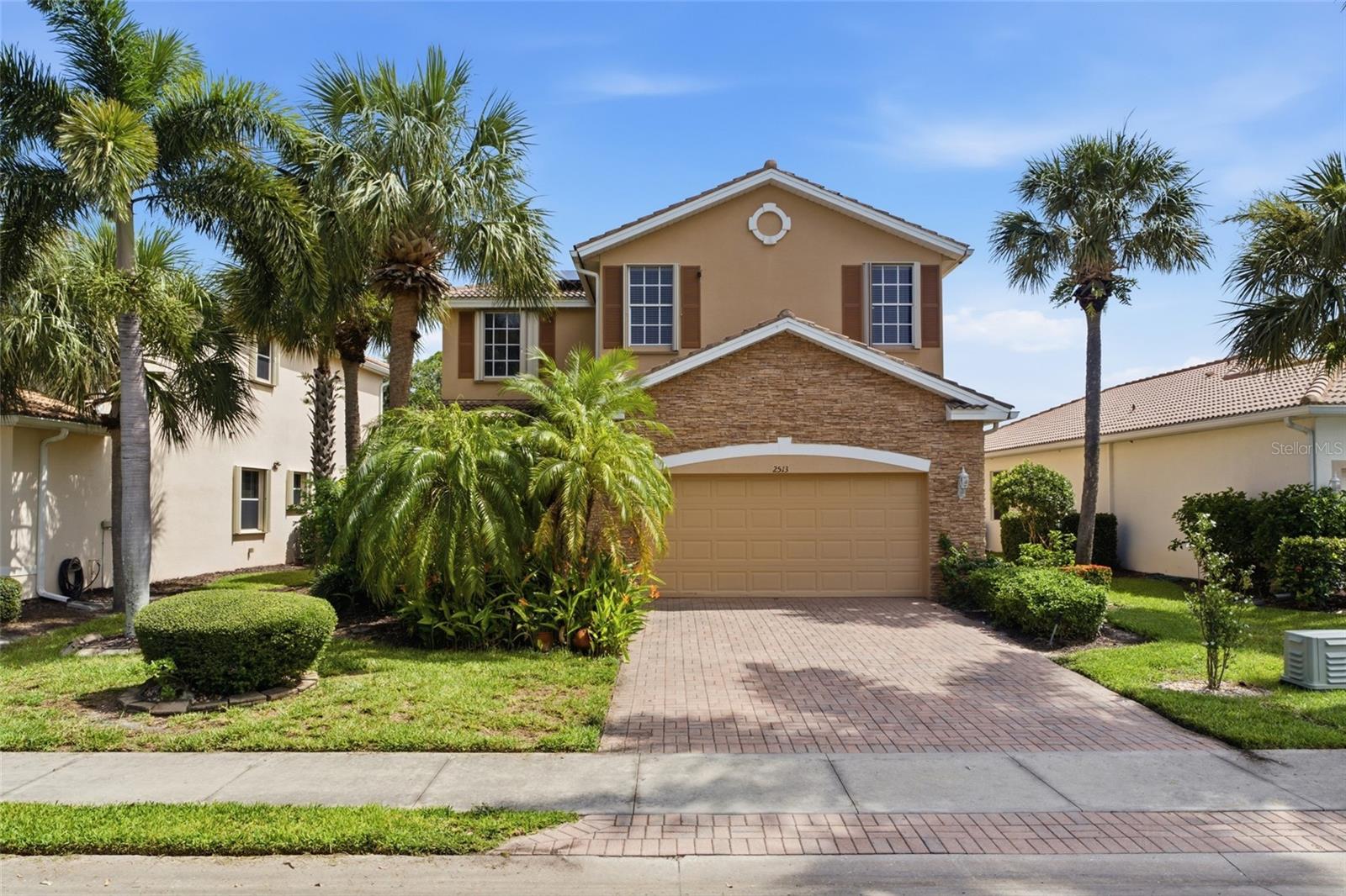 Enjoy over $4,000 in annual energy savings with paid-in-full solar panels while experiencing comfortable lakefront living in the gated community of Coral Lakes. This spacious two-story home offers 4 bedrooms, 3 bathrooms, a den, and a 2-car garage. Designed for both everyday living and entertaining, the home features a bright, open floor plan with soaring high and vaulted ceilings, tile and luxury vinyl flooring throughout, a freshly painted interior, and peaceful lake views from the screened lanai.

INTERIOR FEATURES

• 4 bedrooms, 3 bathrooms, plus den
• 2-car attached garage
• Freshly painted interior
• Bright, open-concept floor plan
• Tile flooring throughout the main living areas
• Luxury vinyl flooring throughout the second floor
• High and vaulted ceilings
• Spacious living room and dining room
• Abundant natural light

KITCHEN FEATURES

• Eat-in kitchen
• All appliances included
• Granite countertops
• Breakfast bar
• Closet pantry
• Open to the main living areas

FLEX SPACE

• Main-floor den with an attached full bathroom
• Ideal for a home office, media room, playroom, guest suite, or potential fifth bedroom

PRIMARY SUITE

• Spacious primary bedroom
• Large walk-in closet
• Private en-suite bathroom
• Split dual-sink vanities
• Soaking tub
• Walk-in shower

GUEST BEDROOMS & BATHS

• Three generously sized guest bedrooms
• Built-in closets in each bedroom
• Full guest bathroom
• Dual-sink vanity
• Tub/shower combination

OUTDOOR FEATURES

• Large screened lanai
• Beautiful lake views
• Expansive backyard
• Plenty of room for a custom pool
• Perfect for relaxing or entertaining

COMMUNITY FEATURES – CORAL LAKES

• Gated, deed-restricted community
• Resort-style clubhouse
• 2 Community swimming pools
• Fitness center
• Tennis courts
• Basketball courts
• Sand volleyball court
• Playground
• Park
• Ball fields

LOCATION HIGHLIGHTS

• Convenient access to shopping and dining
• Close to schools and medical facilities
• Easy access to major roadways
• Short drive to parks, golf courses, boating, fishing, and Gulf beaches

Whether you're searching for a full-time residence, seasonal getaway, or investment opportunity, this move-in-ready home combines generous living space, valuable energy savings, and outstanding community amenities in one of the area's most desirable gated communities. Schedule your private showing today!