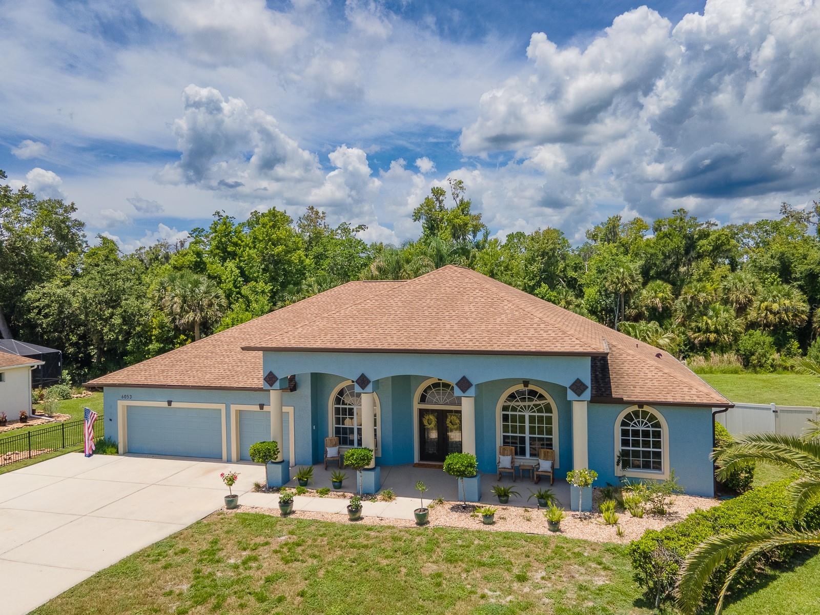 Tucked away on a quiet cul-de-sac in one of Port Orange's most desirable neighborhoods, this beautifully renovated 4-bedroom, 3-bathroom home offers over 3,200 square feet of exceptional living space, a private preserve setting, & a heated pool and spa designed for year-round enjoyment.
From the moment you arrive, you'll appreciate the pride of ownership & extensive improvements made throughout the home. With well over $100,000 invested in recent updates, this property delivers the peace of mind & modern finishes today's buyers are seeking.
Inside, you'll find a spacious & versatile floor plan featuring formal & casual living spaces, a dedicated office, generous bedrooms, & abundant natural light. Plantation shutters throughout add timeless elegance while providing energy efficiency and privacy.
The centerpiece of the home is the stunning chef's kitchen, completely redesigned in 2021 with more than $75,000 in upgrades. Featuring quartz countertops, custom cabinetry, premium stainless steel appliances, a statement vent hood, designer backsplash, & extensive prep and storage space, this kitchen was thoughtfully created for both everyday living and entertaining.
The spacious primary suite offers a private retreat with direct pool access & a beautifully updated ensuite shower. Additional bedrooms and living spaces provide flexibility for growing families, guests, multi-generational living, or working from home.
Step outside and discover what truly sets this property apart. The large backyard overlooks a protected preserve, providing exceptional privacy with no rear neighbors and tranquil natural views rarely found in today's market. Enjoy morning coffee while watching deer wander through the preserve or unwind in the evening from the comfort of your screened lanai.
The outdoor living area features a heated swimming pool & spa enclosed by a newly rescreened enclosure, creating the perfect setting for entertaining, relaxing, and enjoying Florida's outdoor lifestyle year-round.
Major improvements include: 
• New Roof (2020) 
• Complete Luxury Kitchen Remodel (2021) 
• New Exterior Paint (2021) 
• Updated Interior Paint Throughout 
• New Flooring Throughout Much of the Home 
• Updated Laundry Room Cabinetry 
• New HVAC System (2025) 
• New Pool Screen Enclosure (2025) 
• Plantation Shutters Throughout 
• Numerous Fixture and Lighting Updates 
Additional features include a three-car garage, oversized driveway, mature landscaping, fruit trees & a premium preserve lot that offers both beauty and privacy. 
Conveniently located near highly rated schools, shopping, restaurants, medical facilities, golf courses, and just minutes from the beach, this home combines luxury, comfort, & location in one exceptional package. 
Properties with preserve views, no rear neighbors, extensive renovations, and a heated pool and spa rarely become available in Sabal Creek. This is a true move-in-ready opportunity where every major improvement has already been completed for the next owner.