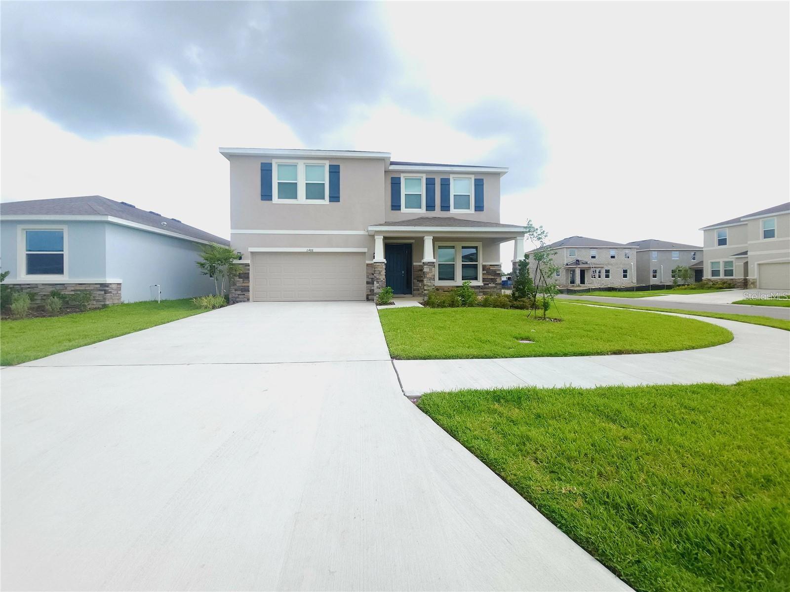 This Beautiful Upgraded HOLDEN Model floor plan- the most popular home design available in Woodcreek- offers an Open and Airy layout, 4 Large Bedrooms, 3 Full Bathrooms, and 3313 sqft of space to make your own!  Enjoy Convenience and Functionality with a Butler's Pantry plus Walk-in Storage Pantry in the Kitchen, High Ceilings throughout the Home, Generous Bedrooms with ample Closet space, as well as a uniquely positioned Laundry Room on the 2nd floor. The Guest Bedroom and Full Bathroom on the 1st Floor are both ideal for your out of town visitors, while the Flex Space with French Doors at the front of the home is perfect for your own personal Home Office, Library, or Den. On the 2nd Floor you will find the Expansive Master Bedroom with separate Seating Area, Master Walk-In Closet, Master Bath with 2 separate sinks, large standing shower and soaker tub, as well as two additional Bedrooms- both big enough to fit King Beds, a 2nd Full Bathroom with dual sinks, and a Spacious Loft, which awaits your ideas for a movie theatre, playroom, or even workout space! Woodcreek is a picturesque new community in a convenient location, surrounded by the natural beauty of forest preserves, ponds, and walking trails. With the Shops at Wiregrass only 5 miles way, the Tampa Outlets about 8 miles away, and the Highly-Rated School Zone of Double Branch Elementary, Dr. John Long Middle School, and Wiregrass High School, you've got everything you need right at your fingertips in booming Wesley Chapel!