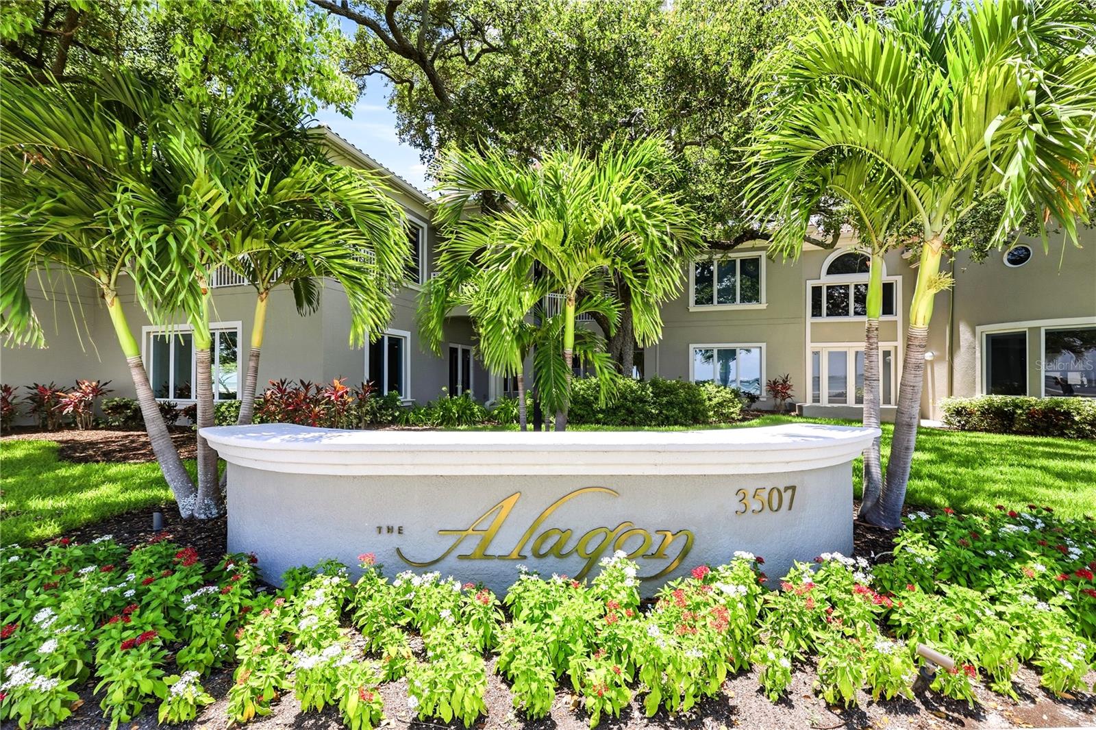 PRIVATE ENTRANCE 5 BEDROOM TOWNHOME WTH CONDO AMENITIES ON BAYSHORE BLVD. Exceptional opportunity awaits at The Alagon. This is your opportunity to own one of only 3 "City Home" TOWNHOMES ON BAYSHORE BLVD.
NOTHING ELSE compares to the privacy and comfort of a luxury townhome with 2 CAR GARAGE and the unparalleled amenities and services of one of Tampa’s premier waterfront residences.

Beautifully updated and impeccably appointed, this extraordinary five-bedroom, five and a half-bath residence is the epitome of timeless elegance and sophisticated design. Every detail has been thoughtfully curated, from the grand staircase and designer lighting to the exquisite finishes found throughout. Bonus to have a full en-suite bedroom downstairs for guests or multi generational living. Upstairs primary includes a sitting area, a separate office or nursery, spectacular primary spa bath with floating tub and walk-in shower, extra large walk-in closet with additional built-in storage and Bayshore views from every angle. Covered balcony makes this the perfect place to enjoy morning coffee.

Designed for both the passionate chef and the consummate host, the spectacular gourmet kitchen serves as the heart of the home, offering exceptional craftsmanship, premium appliances to include Wolf induction cooktop, DUAL SUB-ZERO REFRIGERATOR WITH BEVERAGE DRAWERS, DOUBLE WOLF OVENS, wine refrigerator, ice maker, and generous open floorplan for entertaining on any scale. One touch controls for lighting, electric shades, whole house entertainment. Electric fireplace sets the perfect backdrop for sophisticated entertaining.

French doors and breathtaking views enhance nearly every room, filling the home with abundant natural light while creating a seamless connection to the beauty of Bayshore Boulevard. Expansive living spaces provide an effortless blend of refinement and comfort.

Enjoy the rare advantage of a detached residence complete with a private two-car garage, while indulging in the full-service lifestyle and exceptional amenities offered by The Alagon. This is a 24 hour concierge building for added security and privacy. Gym, pool, card/game room in condo tower and furnished guest suites. Truly one-of-a-kind opportunity to experience luxury living at its finest—exceptional in every way.