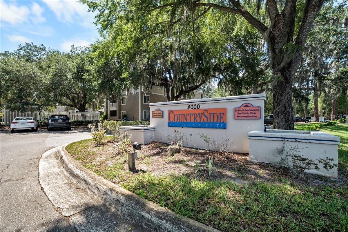 TOP FLOOR 4 bed/4 bath condo ideally located near the University of Florida, UF Health Shands Hospital, and popular shopping and dining. Just a 5-7 minute drive to UF/Shands, located on several direct bus routes to undergraduate classes. This move-in ready unit features an upgraded kitchen with newer cabinets and modern laminate wood and tile flooring throughout (NO CARPET!). Enjoy a spacious living area that opens to a covered and screened porch with a storage closet, perfect for extra space and relaxation. Each of the four bedrooms includes its own private bathroom and walk-in closet, making this an excellent layout for privacy and to maximize rental income.  Community amenities include a pool, fitness center, basketball court, volleyball court, and high speed internet(Gator.NET) included in the monthly association fee. Whether you’re looking for a comfortable personal residence or a turnkey investment with lots of rental income potential, this top-floor condo delivers exceptional value in one of Gainesville’s most convenient locations.