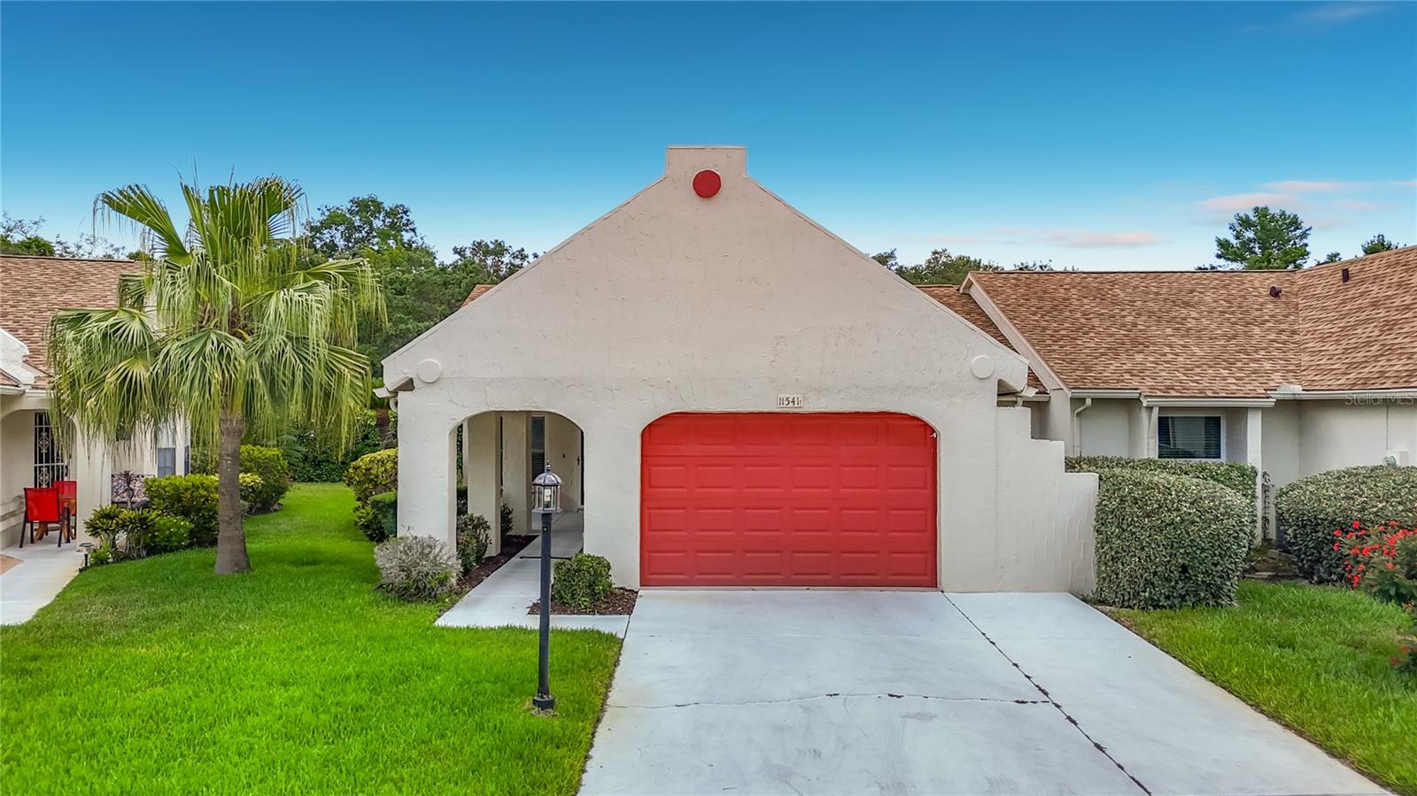 PRICED TO SELL!  Welcome to this charming, move-in ready condo nestled in the desirable 55+ Capri Village section of Timber Oaks. Enjoy peace of mind with a newer roof (2022, maintained by HOA), hurricane windows, tile flooring throughout and a newer AC. The warm and inviting living room/dining room combo offers a comfortable space for relaxing or entertaining guests. The eat-in kitchen features newer stainless-steel appliances and beautiful plantation shutters. This split bedroom plan provides privacy, with the spacious master suite boasting a walk-in closet and a master bath with an updated vanity. The second bedroom is generously sized, perfect for guests or extra storage. A full second bath with wood look tile and updated vanity adds convenience for visitors. Step outside to a small back patio where you can enjoy your morning coffee or unwind in the evenings enjoying the variety of birds and wildlife. Additional features include stunning plantation shutters and crown molding throughout. Located in a vibrant community with amenities tailored for active adults, this villa combines modern upgrades with comfort and style. Don’t miss your chance to live in Timber Oaks’ Capri Village—schedule your showing today! HOA fee covers building exterior maintenance, all exterior grounds, building insurance, roof, escrow, cable/internet, pest control. Master fee covers pool, clubhouse, tennis courts, bocce ball court, shuffleboard, covers large, heated pool, spa, fitness center, library, auditorium, rooms for sewing, billiards, computer, cards, wood working, and art. This home has been well maintained and ready for new owners.  Minutes from US 19 and Close to the Suncoast parkway for quick access to the airport, Tampa, Clearwater and St. Pete Beaches (Ranked in the top 5 Beaches in the US), also close to SunWest Park…an outdoor recreation water park, beach, swimming and gorgeous sunsets, Homosassa Springs, the famous Weeki Wachee live mermaids and Tarpon Springs Sponge Docks. Short drive to beautiful downtown New Port Richey…a historic Rivertown community in north Tampa Bay with award-winning restaurants, shops, bars, and breweries. Natural amenities like Sims Park, the Cotee River, and James E. Grey Preserve are waiting to be explored.