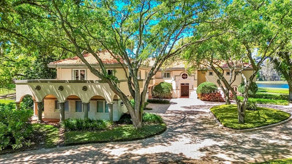 One or more photo(s) has been virtually staged. Welcome to one of the most breathtaking estates in Avila at Tampa Bay’s premier gated golf and country club community. Perfectly positioned on an extraordinary 1.57-acre homesite showcases this 10,222-square-foot residence that captures sweeping unobstructed views of the golf course that offers an unparalleled sense of privacy and beauty. This magnificent estate features 8 ensuite bedrooms, 8 full bathrooms and 2 half bathrooms. A private guest apartment is complete with its own entrance and full kitchen with living room and bedroom is perfect for extended stays or multigenerational living. This meticulously designed and masterfully constructed, every detail of this estate was thoughtfully curated to maximize its spectacular setting and elevate the experience of luxury living.  A private tree-lined driveway leads you to the estate where you immediately are captivated by its striking architectural design and timeless elegance. The abundant windows bask the residence in natural light with breathtaking golf course views creating a stunning backdrop setting the tone for this truly exceptional residence. This home is designed for both grand entertaining and everyday living in mind. The formal living and dining rooms flow seamlessly together with elegant French doors opening to the covered lanai for effortless indoor-outdoor living. The spectacular family room is showcases a soaring 24-foot coffered ceiling and a dramatic fireplace that anchors the space. Floor-to-ceiling windows flood the room with natural light and perfectly frame the picturesque views creating an inviting setting for both gathering and relaxation. The kitchen opens to the family room and the adjoining casual dining area provides the perfect setting for informal meals and morning coffee. A versatile home office offers exceptional flexibility and can easily be transformed into a media room or private theater. The first floor is complete with a private ensuite bedroom featuring elegant French doors that open to its own secluded patio that is perfect for enjoying the Florida sunshine. This inviting space offers an ideal retreat for guests seeking comfort and privacy. Upstairs, the primary suite offers sweeping golf course and water views creating a serene and luxurious retreat. A private balcony, adjacent to the primary bedroom, provides the perfect setting to unwind at the end of the day and take in the breathtaking surroundings. The spa-inspired primary bath features his and hers walk-in closets and serves as a tranquil sanctuary designed for relaxation and rejuvenation.There are an additional four generously sized ensuite bedrooms on the second floor each featuring its own walk-in closet along with a spacious bonus room and an additional office.  The outdoor living spaces are truly breathtaking featuring a resort-style swimming pool and spa with an adjoining gazebo. There is simply no better place to enjoy the Florida sunshine while basking in the magnificent setting of this breathtaking estate in Avila.