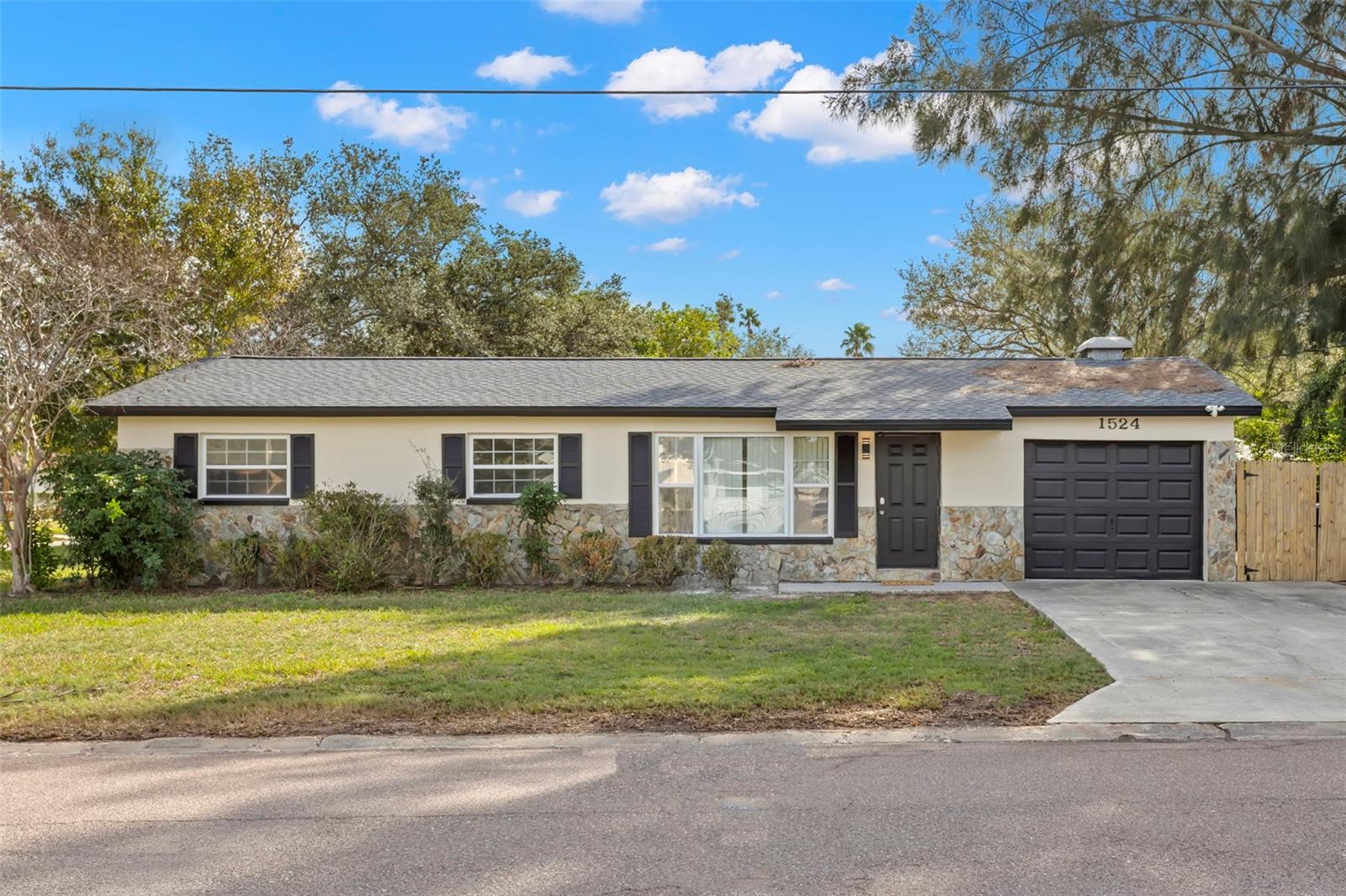 Nestled in the highly desirable Shore Acres neighborhood of Northeast St. Petersburg, this beautifully renovated home offers the perfect blend of modern style, everyday comfort, and an unbeatable location. Set on a spacious corner lot, this 3 bedroom, 2 bathroom, 1 car garage home has been thoughtfully updated over the last few years with stylish finishes throughout, creating a move-in-ready retreat you'll love coming home to. Luxury vinyl plank flooring flows seamlessly throughout the home, while the open living room connects effortlessly to the dining area just off the kitchen, creating an inviting layout ideal for both everyday living and entertaining. The beautifully remodeled kitchen features sleek quartz countertops with a matching quartz backsplash, stainless steel appliances, and a clean, contemporary design that serves as the heart of the home. Step outside to the large screened-in lanai, offering the perfect space to enjoy your morning coffee, unwind after a long day, or entertain family and friends while enjoying Florida's beautiful weather year-round.

Living in Shore Acres means embracing one of St. Petersburg's most established and sought-after coastal communities. Just minutes from the sparkling waters of Tampa Bay, you'll enjoy easy access to waterfront parks, walking and biking trails, fishing piers, boat ramps, playgrounds, and endless opportunities to experience the Florida lifestyle. The neighborhood is known for its mature tree-lined streets, welcoming atmosphere, and convenient location just minutes from vibrant Downtown St. Petersburg, where award-winning restaurants, waterfront dining, boutique shopping, museums, live entertainment, and year-round festivals await. Outdoor enthusiasts will love being close to Weedon Island Preserve, Mangrove Bay Golf Course, Cypress Links Golf Course, and numerous nearby parks. Everyday conveniences including Whole Foods Market, Publix, Trader Joe's, The Fresh Market, Target, shopping centers, medical facilities, and countless dining options are all within easy reach. With convenient access to Interstate 275, the Howard Frankland Bridge, Tampa International Airport, and the Gulf Coast's world-famous beaches, this exceptional location truly places the very best of Tampa Bay at your fingertips. Schedule your private showing today!