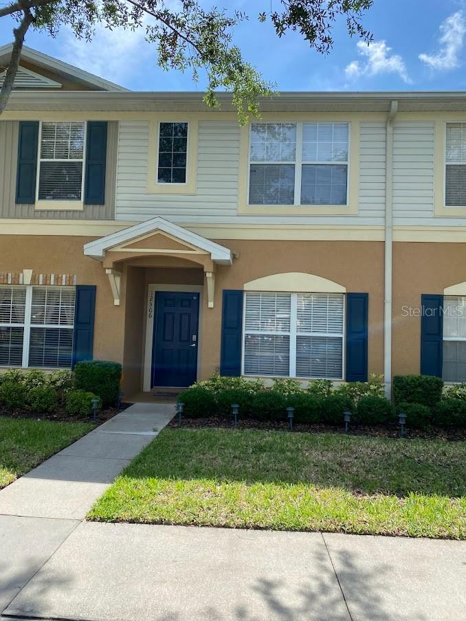 Welcome to this beautifully maintained and fully furnished townhome located in the highly desirable gated community of Panther Trace. This spacious and light-filled home offers a versatile floor plan perfect for comfortable living.

The first floor features an open-concept layout with ceramic tile flooring throughout the great room, kitchen, and half bath. The kitchen is well-appointed with maple-stained cabinetry featuring crown molding, granite countertops, and stainless steel appliances. Sliding glass doors lead to a screened lanai overlooking a serene pond with no rear neighbors—perfect for relaxing or entertaining.

A flexible third bedroom or den is located on the main floor, highlighted by elegant double French doors and dark wood laminate flooring.

Upstairs, you’ll find a generously sized primary suite with vaulted ceilings, a walk-in closet, and an upgraded en-suite bathroom with granite countertops. The secondary bedroom also features its own private en-suite bath, offering added comfort and privacy. New carpet enhances the upstairs living spaces.

Additional features include a full-size washer and dryer, decorative lighting, ceiling fans, and central air conditioning.

Residents of Panther Trace enjoy access to a gated entrance and community pool, along with the convenience of Collins Elementary and Middle School located within the community. Ideally situated just minutes from I-75 and St. Joseph’s Hospital South, this home offers easy access to shopping, dining, entertainment, and some of Florida’s beautiful Gulf Coast beaches.

Don’t miss this opportunity to rent a well-appointed home in one of Riverview’s most sought-after communities.