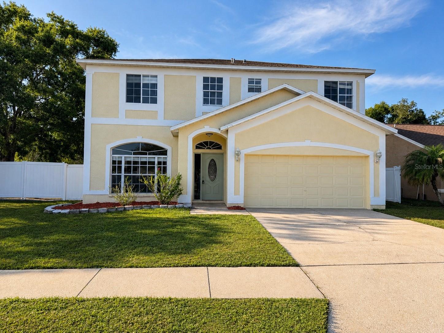 Up to $16,571 in seller credits toward closing costs, prepaids, or an interest rate buydown. Move-in ready 4-bedroom, 2.5-bath two-story on a fenced corner lot with a NEW ROOF (2025), NEW A/C (2026), NEW WATER HEATER (2026), and fresh interior paint throughout. Low $100 quarterly HOA and no CDD in established Heather Lakes. The just-completed refresh also includes a rebuilt staircase, new LED lighting, new blinds, new door hardware, new smoke and carbon monoxide detectors, and updated bath fixtures. The eat-in kitchen offers granite countertops, stainless appliances, wood cabinets with a built-in wine rack, tile backsplash, new disposal, skylight, and a breakfast bar with pass-through to the family room. Sliding glass doors open to a tiled, screened lanai and fully fenced backyard. All four bedrooms plus the laundry room are upstairs. The primary suite features dual walk-in closets and a private bath with dual sinks, garden tub, separate shower, and water closet. The 2-car garage adds a freshly painted floor and a new service door. Zoned for Mintz Elementary, Giunta Middle, and Brandon High. Minutes to shopping and dining with quick access to the Selmon Expressway and I-75 for an easy Downtown Tampa commute. New photos coming soon. Buyer credit available with use of Seller's preferred lender. Schedule your showing today.