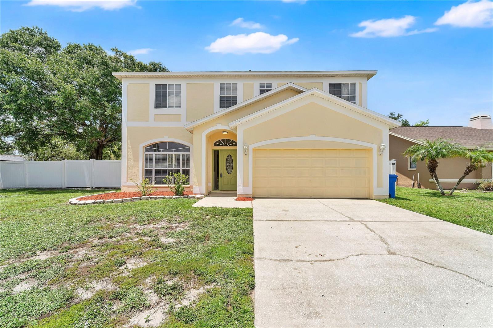 VR tour available. Up to $16,571 in seller credits toward closing costs, prepaids, or an interest rate buydown. Move-in ready 4-bedroom, 2.5-bath two-story on a fenced corner lot with a NEW ROOF (2025), NEW A/C (2026), NEW WATER HEATER (2026), and fresh interior paint throughout. Low $100 quarterly HOA and no CDD in established Heather Lakes. The just-completed refresh also includes a rebuilt staircase, new LED lighting, new blinds, new door hardware, new smoke and carbon monoxide detectors, and updated bath fixtures. The eat-in kitchen offers granite countertops, stainless appliances, wood cabinets with a built-in wine rack, tile backsplash, new disposal, skylight, and a breakfast bar with pass-through to the family room. Sliding glass doors open to a tiled, screened lanai and fully fenced backyard. All four bedrooms plus the laundry room are upstairs. The primary suite features dual walk-in closets and a private bath with dual sinks, garden tub, separate shower, and water closet. The 2-car garage adds a freshly painted floor and a new service door. Zoned for Mintz Elementary, Giunta Middle, and Brandon High. Minutes to shopping and dining with quick access to the Selmon Expressway and I-75 for an easy Downtown Tampa commute. New photos coming soon. Buyer credit available with use of Seller's preferred lender. Schedule your showing today.
