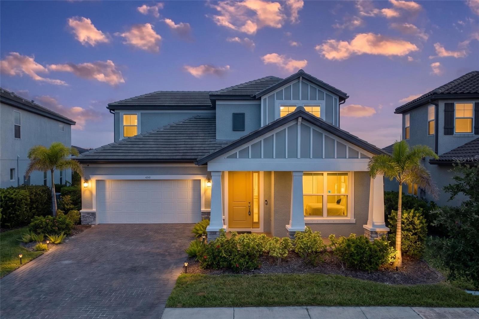 Set within the gated enclave of Worthington, this 2022-built residence offers over 3,100 square feet of modern design and NO CDD FEES. The open-concept layout features 4 bedrooms and 4.5 baths, designed for comfortable everyday living and effortless entertaining. At the center of the home, the Great Room flows into a chef’s kitchen appointed with white cabinetry, quartz countertops, natural gas cooking, and a spacious walk-in pantry. The main-level primary suite provides a private retreat with tray ceilings, a spa-inspired bath, and a walk-in closet. Upstairs, a flexible bonus room opens to a private balcony overlooking the pool, along with a guest suite and ensuite bath ideal for extended stays or added privacy. Outdoor living includes a covered lanai, screened saltwater pool, and full outdoor bath, creating a seamless indoor-outdoor lifestyle. Upgrades include Hunter Douglas shades, gas pool heater, tankless water heater, whole-home water filtration system, storm shutters, and epoxy garage floors. A refined blend of comfort, function, and modern Florida living. 

One or more photo(s) has been virtually staged.