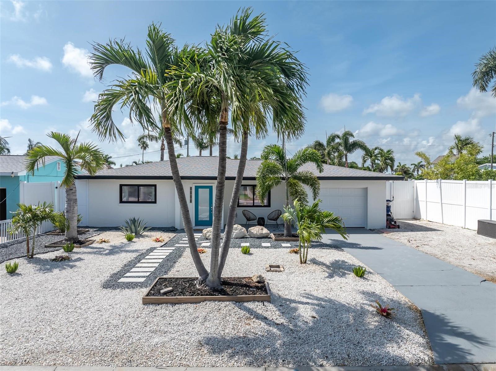 professional photos to come! Welcome to your own slice of paradise just minutes from St. Pete Beach! This beautifully remodeled 3-bedroom, 2-bath pool home blends coastal charm with designer finishes to create the perfect Florida retreat.
Step inside to an inviting open-concept floor plan filled with natural light and thoughtfully designed living spaces. The stunning kitchen flows seamlessly into the breakfast and dining areas, where large windows provide picturesque views of the sparkling pool and backyard oasis. The breakfast room offers an abundance of built-in cabinetry, providing both style and exceptional storage.
Privately situated off the breakfast room, the spacious primary suite serves as a true retreat. The luxurious en-suite bath offers a spa-like experience with high-end finishes and a relaxing atmosphere. On the opposite side of the home, two additional bedrooms provide privacy and flexibility for family, guests, or a home office.
Outdoor living is at the heart of this home. Enjoy your morning coffee, host weekend barbecues, or unwind after a day at the beach beneath your newly re-thatched tiki hut overlooking the pool. The oversized backyard offers plenty of room for pets, play, entertaining, and family gatherings.
Whether you're looking for a primary residence, vacation getaway, or investment opportunity, this move-in-ready home offers the ultimate Florida lifestyle in an unbeatable location close to award-winning beaches, dining, shopping, and everything St. Petersburg is loved for.
Come experience beach living at its finest in this beautifully remodeled coastal retreat.
