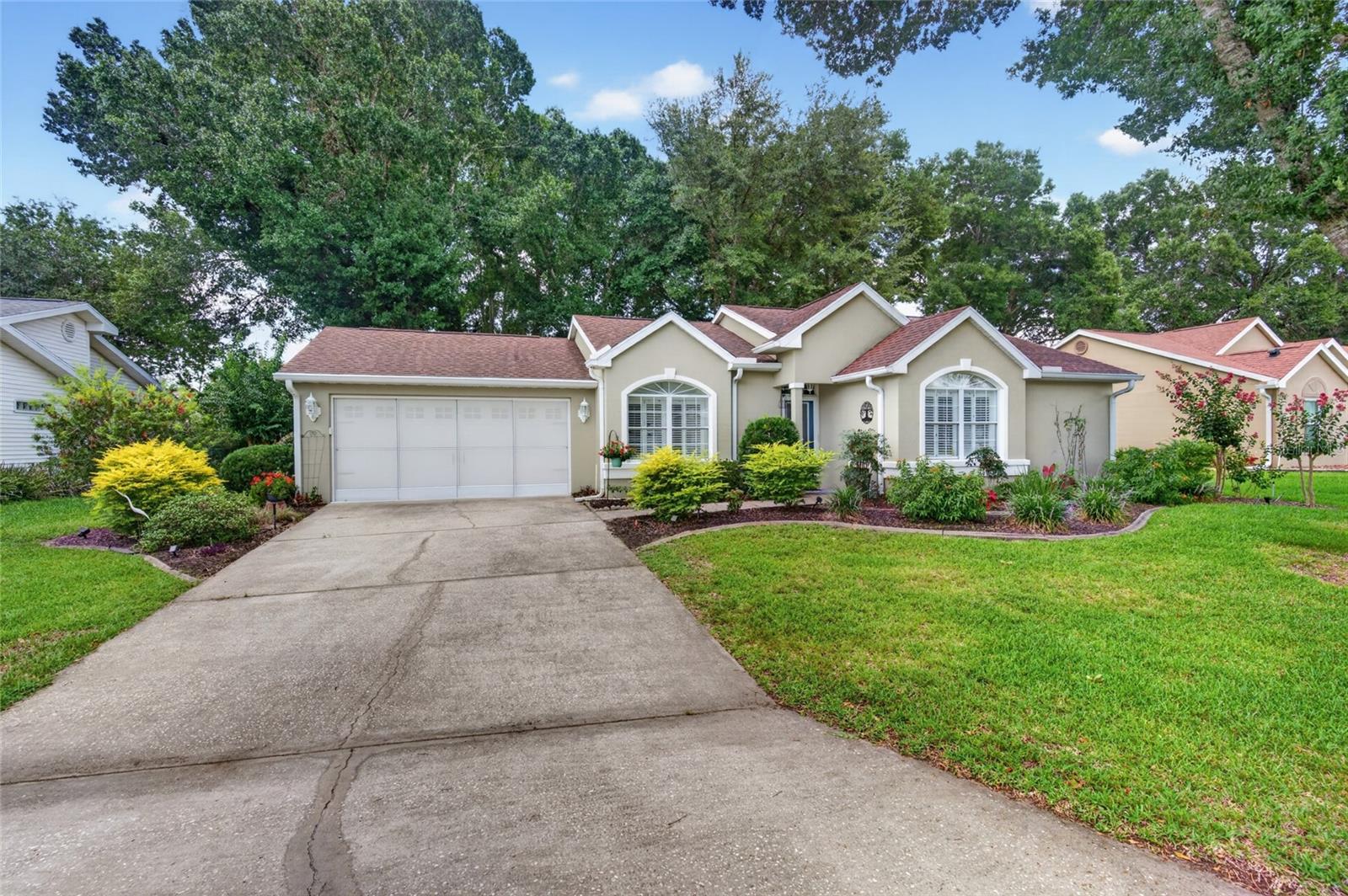 Welcome to this beautifully updated, expanded Fairfax model. 2-bedroom, 2-bath home located in the highly sought-after 55+ community of Oak Run in Ocala. Offering the perfect blend of comfort, style, this meticulously maintained residence is move-in ready and waiting for its next owner.

The updated kitchen features refaced cabinetry, granite countertops, and plenty of workspace for preparing meals and entertaining guests. Both bathrooms have been tastefully remodeled with granite countertops, brand-new walk-in showers, and modern finishes. The added 320 Square foot room off the kitchen overlooks the back yard.

Additional upgrades include new flooring throughout the living room, dining room, and both bedrooms, skylights that provide abundant natural light, plantation shutters throughout, and freshly painted exterior.

Step outside and enjoy the newer paver patio, complete with a French drain for improved drainage and outdoor enjoyment. Additional features include gutter guards and a whole-house central vacuum system, providing added convenience and peace of mind.

Living in Oak Run means enjoying an exceptional lifestyle with six swimming pools, five whirlpool spas, two fitness centers, multiple clubhouses, an 18-hole golf course, restaurant, tennis courts, pickleball, bocce ball, shuffleboard, and more than 100 clubs and activities. Conveniently located near shopping, dining, medical facilities, this home provides the ideal opportunity to enjoy Florida retirement living at its finest.