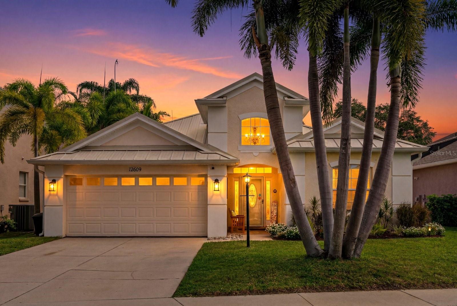 This is the home you have been waiting for! Discover the perfect blend of stunning interior upgrades and a Resort-Style Backyard Oasis you’ll never want to leave!
Welcome to 12609 Rockrose Glen in the highly sought-after Summerfield community of Lakewood Ranch, a beautifully upgraded residence offering the perfect blend of luxury, comfort, and Florida outdoor living. Thoughtfully designed with a desirable triple-split floor plan plus a versatile den/office/flex space, this home delivers both privacy and functionality for families and entertaining alike.
Inside, you’ll find stylish luxury vinyl flooring and crown molding throughout the entire home, creating a seamless and sophisticated feel. The upgraded kitchen is a true centerpiece, featuring granite countertops, stainless steel appliances, custom backsplash, and ample space for gathering and entertaining. The spacious primary suite and two additional en-suite bathrooms have been tastefully updated with modern finishes and spa-like appeal.
Step outside to your own private backyard oasis designed for year-round enjoyment. The saltwater, solar-heated pool was resurfaced with a Pebble-Tech finish in October 2022 and is complemented by a free-standing hot tub, custom outdoor sauna, extended paver patio, and covered lanai with outdoor fan. The fully fenced yard offers privacy and tranquility, enhanced by mature fruit trees and a premium outdoor cooking setup complete with an Egg grill and preparation table, perfect for entertaining Florida-style.
Additional upgrades provide peace of mind and efficiency, including a metal roof (2017), insulated attic, new HVAC system (December 2021), new water heater (2022), water softener system (2022), reverse osmosis kitchen system (2022), and French drains.
Ideally located in the established Summerfield neighborhood of Lakewood Ranch, residents enjoy close proximity to parks, golf courses, walking trails, top-rated schools, shopping, dining, and all the amenities that make Lakewood Ranch one of the nation’s premier master-planned communities. This exceptional property is a rare opportunity to enjoy upgraded indoor living paired with an incredible outdoor retreat.
