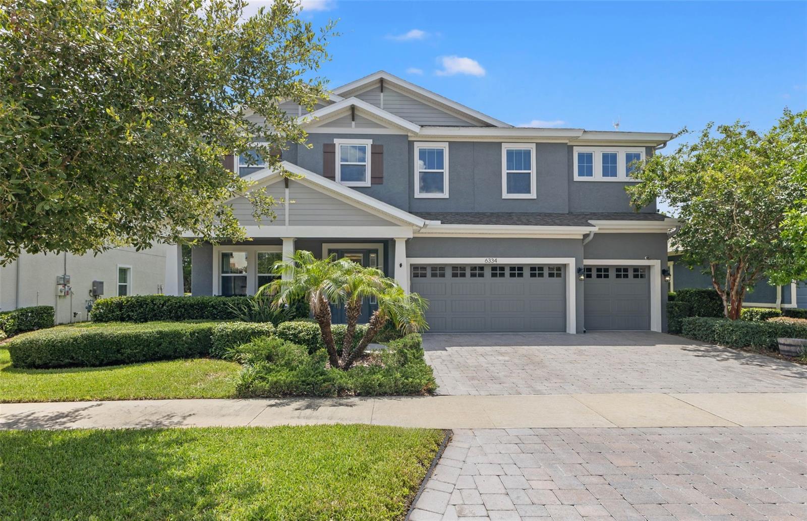 Welcome to this beautifully updated home in the highly sought-after The Oaks community of FishHawk Ranch West, where exceptional amenities, top-rated schools, and a true sense of community come together to create one of Tampa Bay's most desirable places to call home.

Designed for both everyday living and effortless entertaining, this spacious floor plan offers the flexibility today's buyers are looking for, including an ideal layout for multi-generational living. From the moment you step inside, you'll be impressed by the soaring ceilings, grand entryway, and expansive doorways that create an immediate sense of openness and elegance.

Just off the foyer, a versatile flex room with striking oversized barn doors provides the perfect space for a home office, playroom, media room, or private retreat.

The heart of the home is the beautifully appointed kitchen, featuring a gas range, NEW refrigerator, NEW dishwasher, abundant cabinetry, and an open-concept design that flows seamlessly into the dining and living areas, making it perfect for gathering with family and friends. Throughout the home, you'll find updated lighting, stylish ceiling fans, and thoughtfully designed accent walls that add warmth, character, and modern charm.

Upstairs, an expansive loft offers endless possibilities as a game room, second living area, homeschool space, fitness room, or teen retreat. The spacious primary suite serves as a relaxing escape, complete with a private en-suite bathroom. Two secondary bedrooms share a convenient Jack-and-Jill bathroom, while a fourth bedroom is situated near an additional full bath, providing comfort and privacy for family members or guests.

Step outside to your private backyard oasis, where an elegant iron fence frames peaceful wooded views with no immediate rear neighbors, creating a serene setting that's perfect for relaxing, entertaining, or simply enjoying the Florida lifestyle.

Living in FishHawk Ranch West is about more than owning a beautiful home, it's about embracing an exceptional lifestyle. Residents enjoy the Lake House, resort-style pools, fitness centers, miles of scenic walking and biking trails, playgrounds, sports courts, community events, and countless opportunities to connect with neighbors and enjoy the outdoors.

If you've been searching for a move-in-ready home that offers space, style, privacy, and access to one of the area's premier master-planned communities, your search ends here. Welcome home.