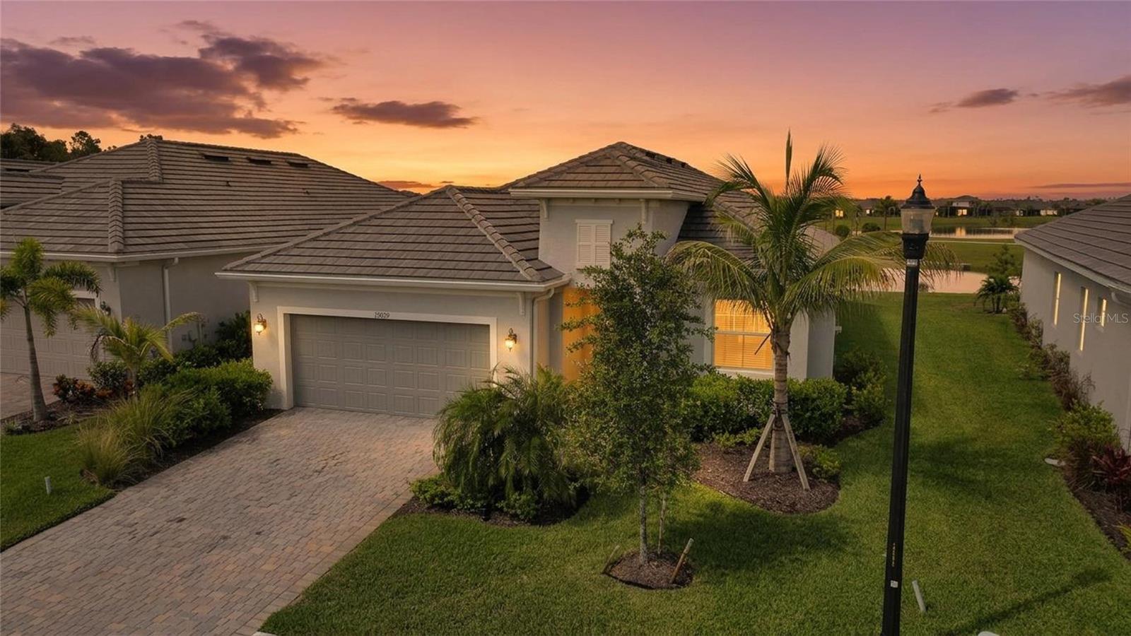 Why wait to build when perfection already exists? This better-than-new 2024 Isabella model,located on a quiet cul-du-sac in Beautiful Heritage Landing Golf and Country Club delivers the lakefront lifestyle, custom upgrades, and resort amenities that buyers dream about — all move-in ready today. This sought-after Isabella floorplan offers 4 bedrooms, 2 bathrooms, and 2,248 square feet of heated living space wrapped in showroom condition. This custom-built layout is elevated with designer lighting throughout, crown molding in every room, and a gorgeous lakefront setting that brings tranquil water views to your everyday living. Heritage Landing Golf and Country Club spans 1,800 acres of breathtaking landscapes, serene lakes, and lush preserves, secured by a guard-gated entry. An 18-hole championship golf course boasting superior Paspalum grass, an aqua driving range, and professional-grade putting green; a stunning resort-style pool featuring gradual entry and lap lanes plus four satellite pools; three restaurants including an outdoor pool café and two full-service bars (the community's beloved Tiki Bar); six Har-Tru tennis courts, 6 Pickleball courts, and two bocce courts; a state-of-the-art fitness center, an aerobics room, and a full-service spa offering nail and massage services; and a tennis social courtyard along with men's and ladies' locker rooms equipped with showers and saunas. Not only is this a Smart home it is also a Smart investment. The Heritage Landing community sits in the heart of the Burnt Store Corridor, on the west side of Burnt Store Road just five miles south of US 41, offering quick access to Charlotte Harbor, Punta Gorda Airport, downtown Punta Gorda, and Fishermen's Village, with I-75 putting Fort Myers and Cape Coral within easy reach. For boaters, this address is unbeatable: Burnt Store Marina — the largest deep-water marina on Florida's west coast — is just 5 miles away, making this corridor one of the most desirable in all of Southwest Florida for buyers who want golf, water, and a true resort lifestyle in one address. As the Burnt Store Corridor continues to develop and demand grows, homes like this one — already upgraded, already lakefront, already showroom-ready — are positioned to hold and build value well into the future. You are not just buying a home. You are buying a Lifestyle that you  & your family will enjoy for years to come.