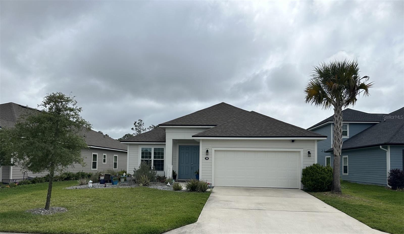 Welcome to this meticulously maintained, one-owner pool home in the gated Grand Landings community. Built in 2022, this 4-bedroom, 2-bath residence offers 1,908 square feet of thoughtfully designed, single-story living space with an attached 2-car garage. The open-concept floor plan connects the kitchen, dining and living areas, creating an inviting space for everyday living and entertaining. Double sliding glass doors fill the main living area with natural light and open to the covered lanai and private pool. The kitchen features granite countertops, crown-molded wood cabinetry, a spacious pantry, oversized center island and dedicated coffee bar. The primary suite overlooks the pool and wooded backyard and includes a large walk-in closet. The en-suite bathroom features dual vanities, granite countertops, a soaking tub, separate walk-in shower and private water closet. Three additional bedrooms with flexibility for guests, a home office or hobbies. Outside, enjoy a spacious screened lanai with no-see-um screening and a heated, saltwater pool with lighting. The backyard overlooks a peaceful wooded and water view, providing added privacy and a relaxing setting. Additional features include an interior laundry room, ceiling fans, tray ceilings, ceramic tile, laminate and carpet flooring, an irrigation system, landscape lighting, alarm system and garage door opener.
Grand Landings amenities include a community pool, clubhouse, playground, dog park, sidewalks and golf-cart-friendly streets. Conveniently located near shopping, dining, medical services, parks and Palm Coast attractions.