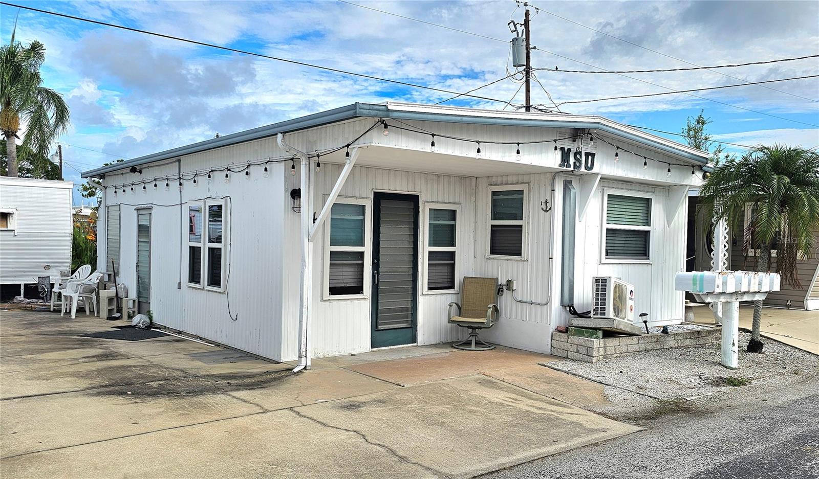 Opportunity awaits in Paradise Bay! This 1BR/1BA mobile home is the perfect blank canvas for your vision and creativity. Flooded during the 2024 storms and now ready for renovation, this home offers an affordable chance to design the coastal retreat, seasonal getaway, or retirement escape you've always imagined.

Located in the highly desirable Paradise Bay Estates, an active 55+ waterfront community on the shores of Sarasota Bay, residents enjoy an abundance of amenities and activities, including a heated pool, clubhouse, social events, live music, shuffleboard, and more. Spend your evenings watching spectacular sunsets over Longboat Key and Anna Maria Island, or simply relax and enjoy the peaceful bayfront lifestyle.

With endless potential and a premier location, this is your chance to breathe new life into a home and make it uniquely your own. Bring your ideas, your contractor, and your imagination—Paradise Bay is calling!