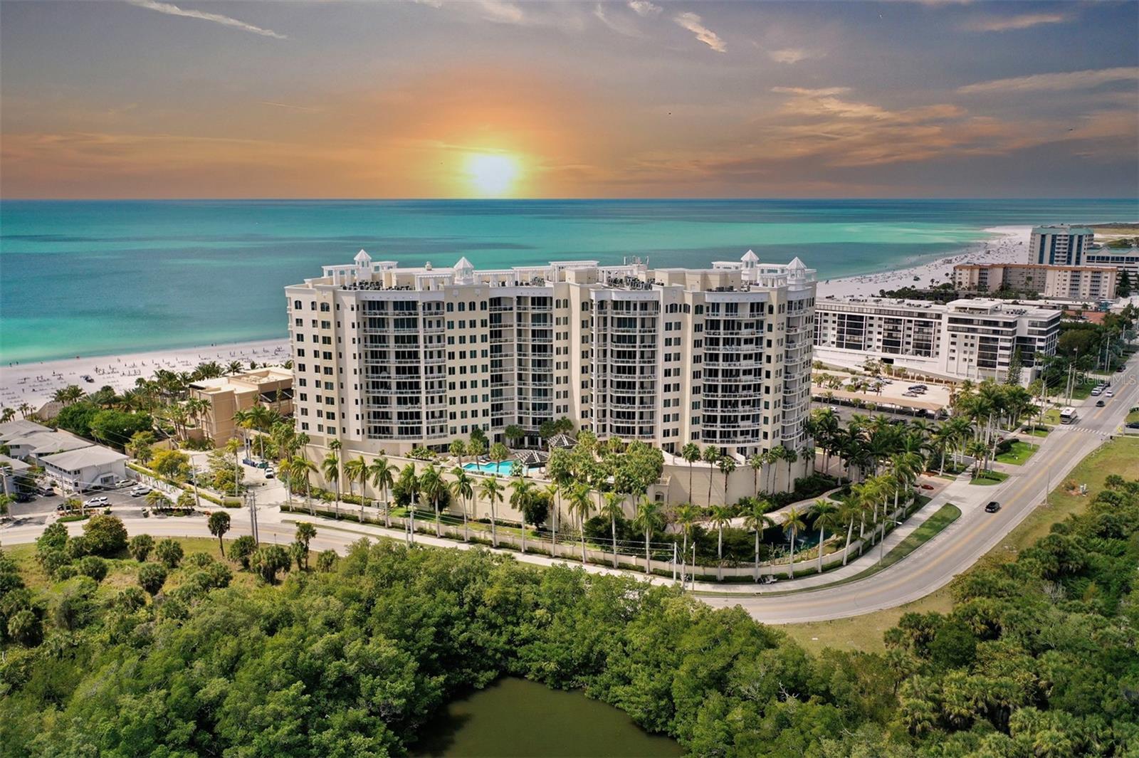 Elegance on the Beach - Luxury Managed by the Ritz-Carlton -The Beach Residence on Lido Key, where concierge and security set the standard for gracious coastal living in Sarasota. Ideal for the executives or a family that cherishes together time, refined beachfront ambience, this residence combines quiet sophistication with spectacular views. This residence has been remodeled and redesigned to perfection. To see it is to fall in love and experience immediate enjoyment.  Residence #809 captures the Sarasota Skyline and Intracoastal Waterway vista, a bird sanctuary, an ecological lagoon, and sweeping panoramas of Siesta Key, accented by the sparkling downtown Sarasota lights at night. Experience intimate, romantic evenings in a serene setting.3 bedrooms and 3 baths, or 2 bedrooms with a den (home office) for enhanced versatility.  
Two primary suites: one with an expansive closet/dressing room; the other offers built-in, oversized closets.  Library/Den/Office: a refined space that can adapt to your needs, now a 3rd bedroom.  Redesigned kitchen equipped for gourmet preparation and entertaining.  10-ft ceilings, an emphasis, and renowned Ritz-Carlton stewardship throughout. Private elevator foyer, floor-to-ceiling glass walls frame panoramic Intercoastal waterway, lagoon, city, sunrise, and moonrise vistas. Generous communal amenities, including a Boardroom, Theater, Sauna, Massage Room, Ping-Pong or Yoga Room, and more, are ideal for work, wellness, and social gatherings.   Location is within easy walking/biking distance, or a short ride on the Ritz-Carlton shuttle bus to St. Armands Circle for dining and boutique shopping.  The Beach Residences combine coastal luxury with effortless, Ritz-Carlton-managed services. Every day feels like a vacation—yet this is your everyday reality. Enter a world where dreams meet coastal living, and where the finest details are front and center.  On-site restaurant and bar, The Beach Club pool, and tiki bar on the beach.  Beach Club Membership included, and no wait list.  Where The Ritz-Carlton Beach Residences align with Lido Key’s sun-kissed coastal lifestyle.