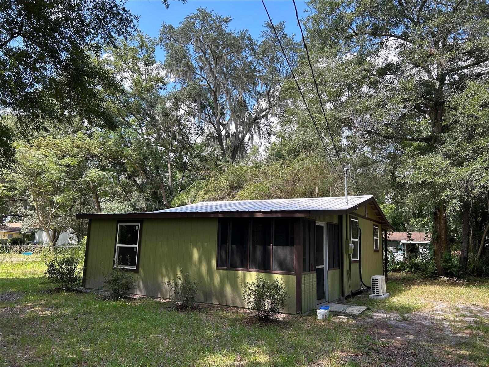 REDUCED PRICE!!  Great home in the country, Just for You! Check out this cute 1/1 Remodeled home with just a short walk to the lake.  Finish the family room just the way you like.  New windows, Vinyl plank flooring, remodeled kitchen and bathroom all in 2022.
Close to Silver Springs State Park, Silver Springs River, Juniper Springs and only about 1 hour from the Beach!
Make your appointment Today!!!