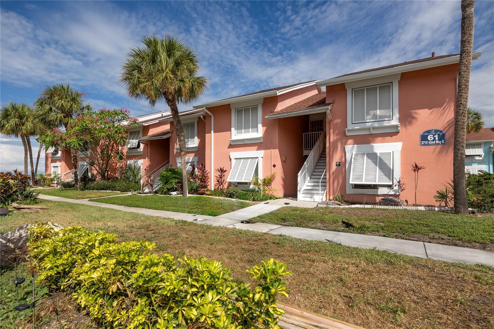 Attention Investors and those looking for a handyman special! Bermuda Bay Beach and Racquet Club is one of Gulfport's best-kept addresses, a gated waterfront community sitting directly on Boca Ciega Bay with private beach frontage and Intracoastal access right outside the door. The setting reads more resort than residential with mature tropical landscaping, shaded common areas, cabanas by the water, and a lifestyle that rewards people who came to Florida to actually live near it.
The community delivers on amenities across the board. Two pools, a heated in-ground spa, tennis courts, racquetball courts, shuffleboard, a golf practice area, a clubhouse, and a playground, all within a secure, gated entrance with manicured grounds and direct beach access on Boca Ciega Bay. Two on-site laundry facilities serve the community, and the Pinellas Trail is close by for cycling, jogging, or a leisurely walk along the coast.
This second-floor corner unit is a one-bedroom, one-bath condo with an open floorplan, a living and dining room combination, a generously sized primary bedroom with walk-in closet, and a balcony with southeast exposure overlooking the private beach. It is priced to reflect its current condition and represents a clean canvas for a buyer ready to renovate to their own standard in a location that justifies the investment.
The monthly fee of $734 covers cable, internet, water, sewer, trash, pest control, exterior maintenance, grounds, pool maintenance, and the escrow reserves fund, a straightforward cost structure for an owner or investor. Pets are welcome (up to 2, max 20 lbs each), and the minimum lease period is one month, supporting seasonal and short-term rental strategies.
The surrounding area adds to the appeal. Gulfport Yacht Club, Mariners Cove Marina, and Clam Bayou Nature Park are all within close reach, alongside the Gulfport Arts District, the beaches of St. Pete Beach, and downtown St. Petersburg, all within fifteen minutes and consistent demand drivers for Pinellas County rental inventory at this price point.