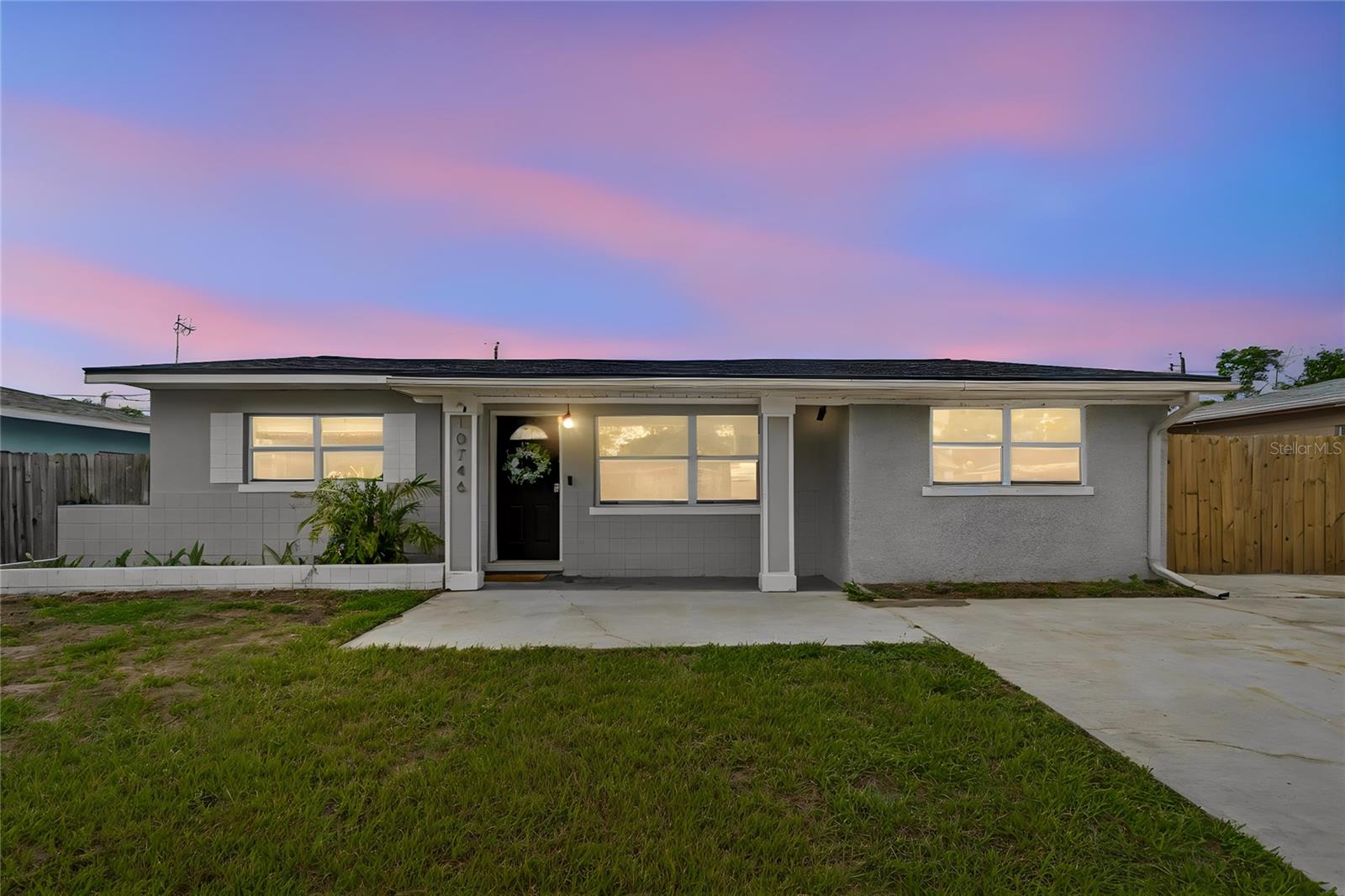 Welcome home to this charming 3-bedroom, 2-bath split-plan home ideally located in the desirable Seminole/Largo area in unincorporated Pinellas County! From the moment you arrive, you'll appreciate the oversized driveway and convenient double swing gate off to the side offering additional parking space to store a small boat or trailer behind the fence.At the heart of the home, the nicely updated kitchen features granite countertops, stainless steel appliances, a subway tile backsplash, and overlooks the main living areas with wood-look tile flooring throughout. The thoughtful split-bedroom layout offers privacy, with two well-sized guest bedrooms at the front of the home with an updated guest bathroom featuring a granite-topped vanity, subway tile, and a tub/shower combination. The spacious primary suite is tucked away at the rear of the home and offers a large walk-in closet and an updated ensuite bath complete with granite vanity, a frameless glass walk-in shower, and floor-to-floor tile surround. An inside utility room provides added convenience along with additional storage space. Step outside to the generously sized backyard with plenty of room to entertain, relax, or even add the pool of your dreams. New roof (2025), AC (2017), Mini-split (2020), Water Heater (2017), Stainless steel appliances (2021) Located in Unincorporated Pinellas County, this home offers added flexibility while being just minutes from the Florida Botanical Gardens, Walsingham Park,, Gulf Beaches, Shopping, dining, and approximately 30 minutes to Tampa International Airport. Best of all, this home is not located in a flood zone, so no flood insurance is required.