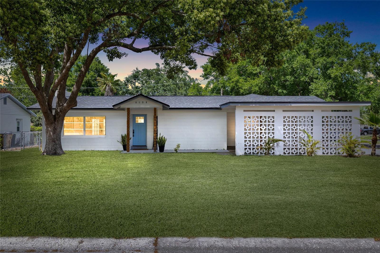 Seller will contribute to the BUYERS' CLOSING COSTS with an acceptable offer! Step into this beautifully renovated, move-in-ready pool home, ideally situated on a desirable corner lot, offering 4 bedrooms, 2 bathrooms, and 1,914 square feet of thoughtfully designed living space—perfectly blending modern style with everyday comfort. From the moment you walk in, you’re welcomed by a bright, open-concept layout and a clean, contemporary design. The home features durable waterproof vinyl flooring throughout, complemented by elegant porcelain tile in the bathrooms, creating a cohesive and upscale feel. The inviting living room, centered around a cozy fireplace, flows effortlessly through French doors to your private backyard oasis—complete with a sparkling pool, ideal for entertaining or simply enjoying the Florida lifestyle year-round. The kitchen has been fully upgraded with sleek quartz countertops, crisp white cabinetry, and stainless steel appliances, offering both style and functionality for everyday living and hosting. Down the hallway, you’ll find well-appointed guest bedrooms and a spacious owner’s suite with tranquil pool views. The en-suite primary bathroom has been fully remodeled into a spacious, spa-like retreat, featuring a double vanity, warm modern tile finishes, and a walk-in shower with a rain shower head and stylish glass enclosure, creating a clean and elevated design that feels both luxurious and functional. The home also features an interior laundry room with additional storage, along with multiple storage closets throughout, providing both convenience and functionality. Additional highlights include a 2-car covered carport, a water softener, and a reverse osmosis filtration system, along with major updates that provide peace of mind—roof (2023) and HVAC (2023). Beyond the home itself, the location truly sets it apart—centrally located just minutes from USF, Busch Gardens, shopping, dining, and with easy access to I-75, making commuting and everyday convenience effortless. This is a rare opportunity to own a turn-key home with a private pool in a prime Tampa location—schedule your private showing today. ****ADDITIONAL OPPORTUNITY WITH THIS LISTING: Take advantage of a special offer through our preferred lender: receive a 1% credit of the loan amount (up to $5,000) to use toward your prepaids and closing costs.