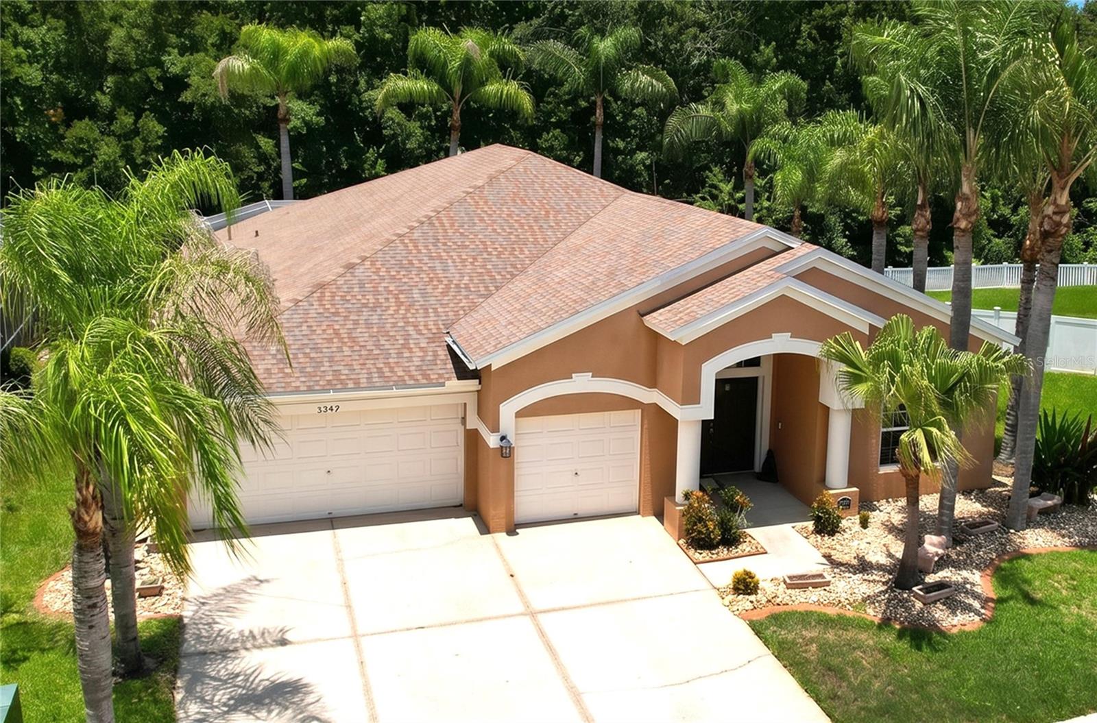 Welcome to 5049 Decidely Court, a four-bedroom, two-bath home with a three-car garage in the Lexington Oaks community of Wesley Chapel.

The home offers a comfortable, well-designed layout with spacious living and dining areas and plenty of natural light. Recent improvements include a roof replaced in 2019, new flooring, fresh interior paint, crown molding, updated fixtures, and updated windows. The kitchen features 42-inch wood cabinetry, generous counter space, a pantry, and newer stainless steel appliances.

The spacious primary suite includes a private bathroom, walk-in closet, and direct access to the pool area. Three additional bedrooms provide flexible space for guests, a home office, hobbies, or everyday needs.

The outdoor living area features a large enclosed saltwater pool and spa, plenty of deck space for relaxing and entertaining, and a quiet, wooded backyard.

Lexington Oaks features a golf course, clubhouse, community pool, and recreational amenities that complement the Florida lifestyle. Shopping, dining, healthcare, and other everyday conveniences are also available throughout the Wesley Chapel area.

With its updated interior, spacious pool area, wooded backyard, and location in Lexington Oaks, this home offers a comfortable place to enjoy everything Wesley Chapel has.