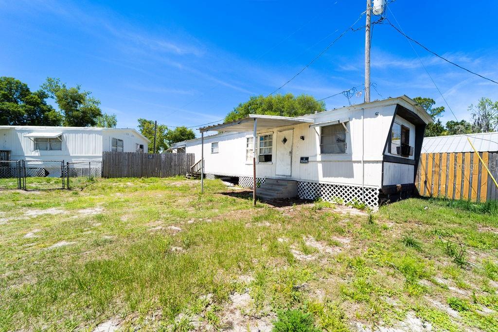 Two homes for the price of one. Double Wide is 4 bedrooms with 2 bathrooms. It rents for $1200 a month. The Single wide has 2 bedrooms and 1, 1/5 bathroom. It rents for $700 a month. Property is zoned MH5 and does not require flood insurance. Not in a mobile home community. No lot rent needed. Properties need TLC.