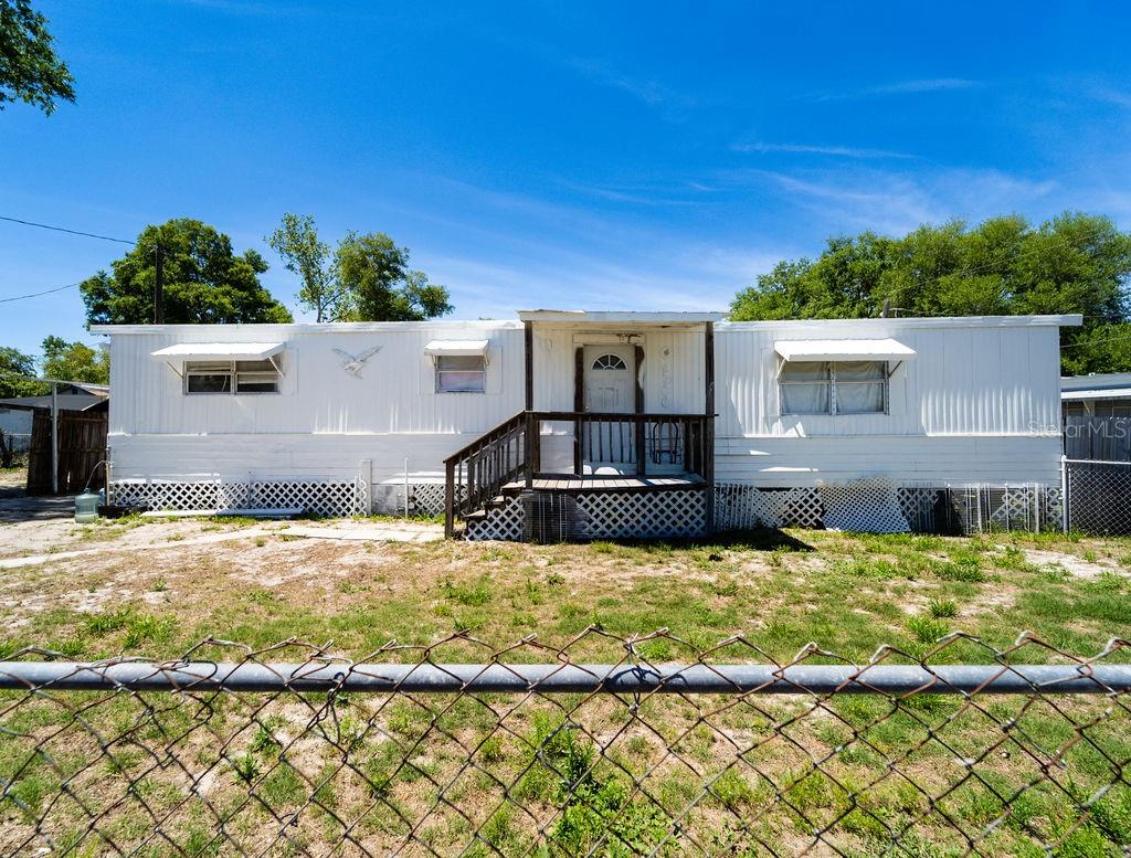 Two homes for the price of one. Double Wide is 4 bedrooms with 2 bathrooms. It rents for $1200 a month. The Single wide has 2 bedrooms and 1, 1/5 bathroom. It rents for $700 a month. Property is zoned MH5 and does not require flood insurance. Not in a mobile home community. No lot rent needed. Properties need TLC.